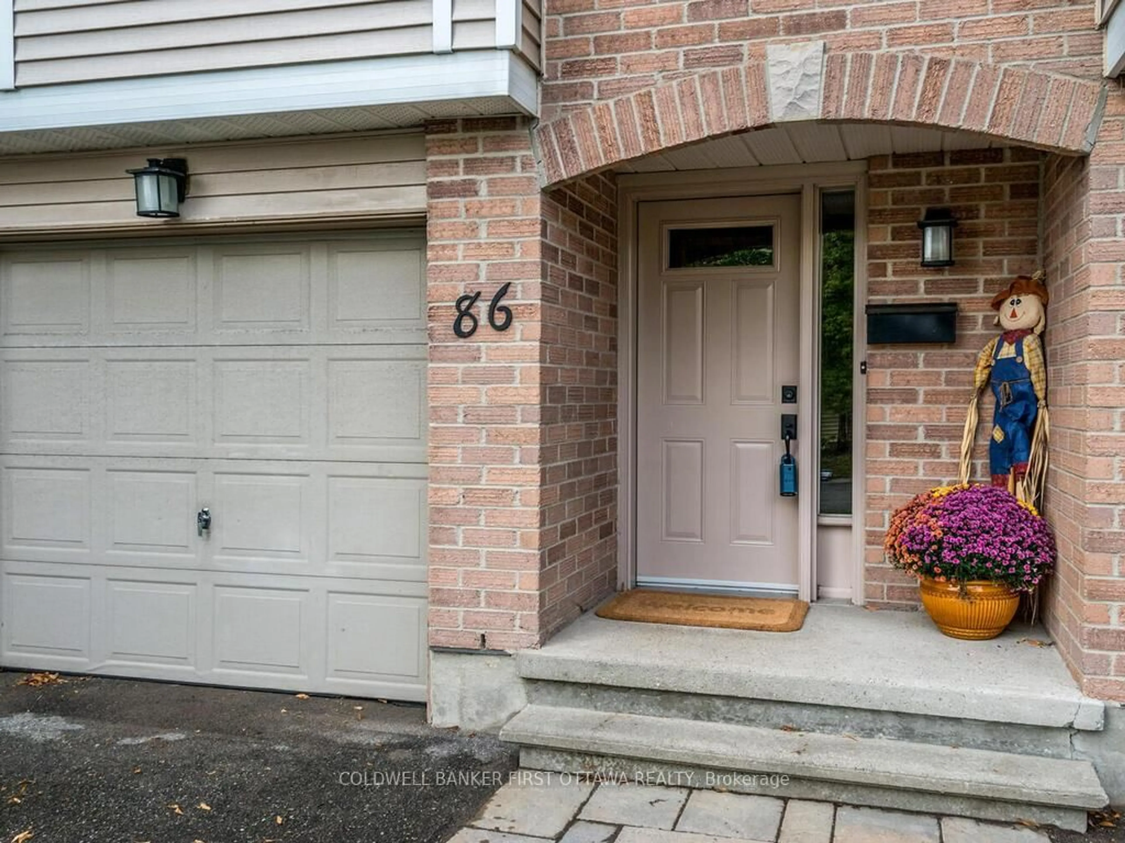 Home with brick exterior material, street for 86 Lightfoot Pl, Ottawa Ontario K2L 3L9