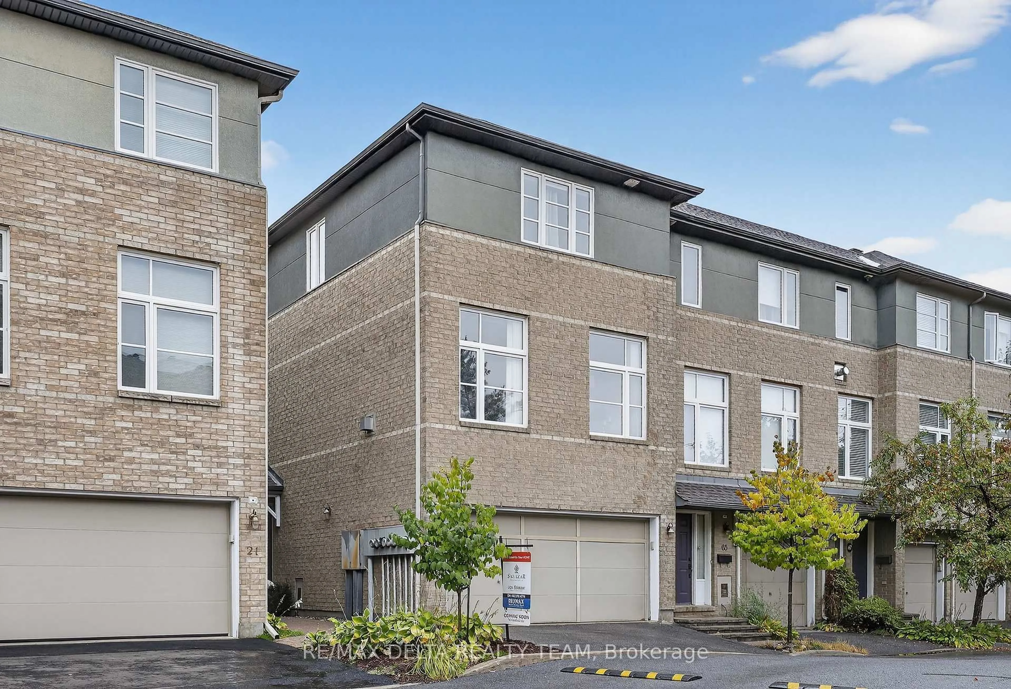 Home with brick exterior material, street for 63 Highwood Private, Ottawa Ontario K1K 4X6