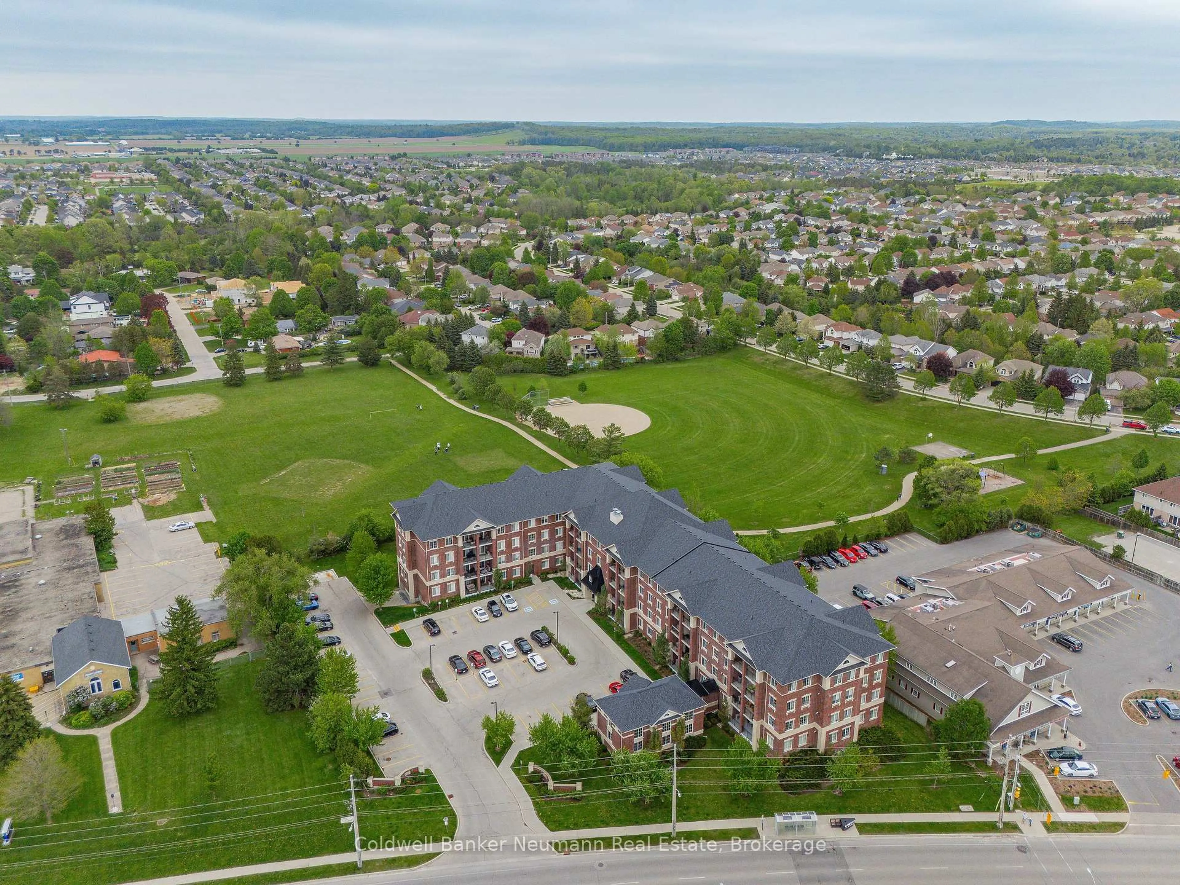 A pic from outside/outdoor area/front of a property/back of a property/a pic from drone, unknown for 1440 Gordon St #116, Guelph Ontario N1L 1C8