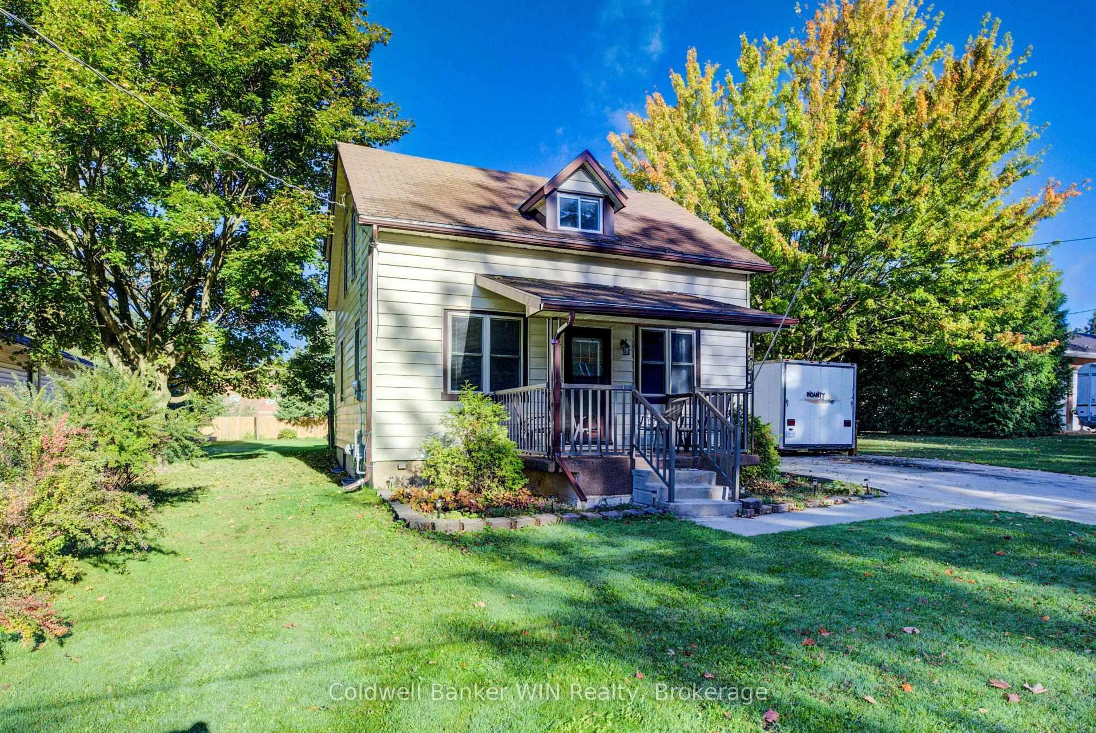 Home with vinyl exterior material, street for 481 Birmingham St, Wellington North Ontario N0G 2L1