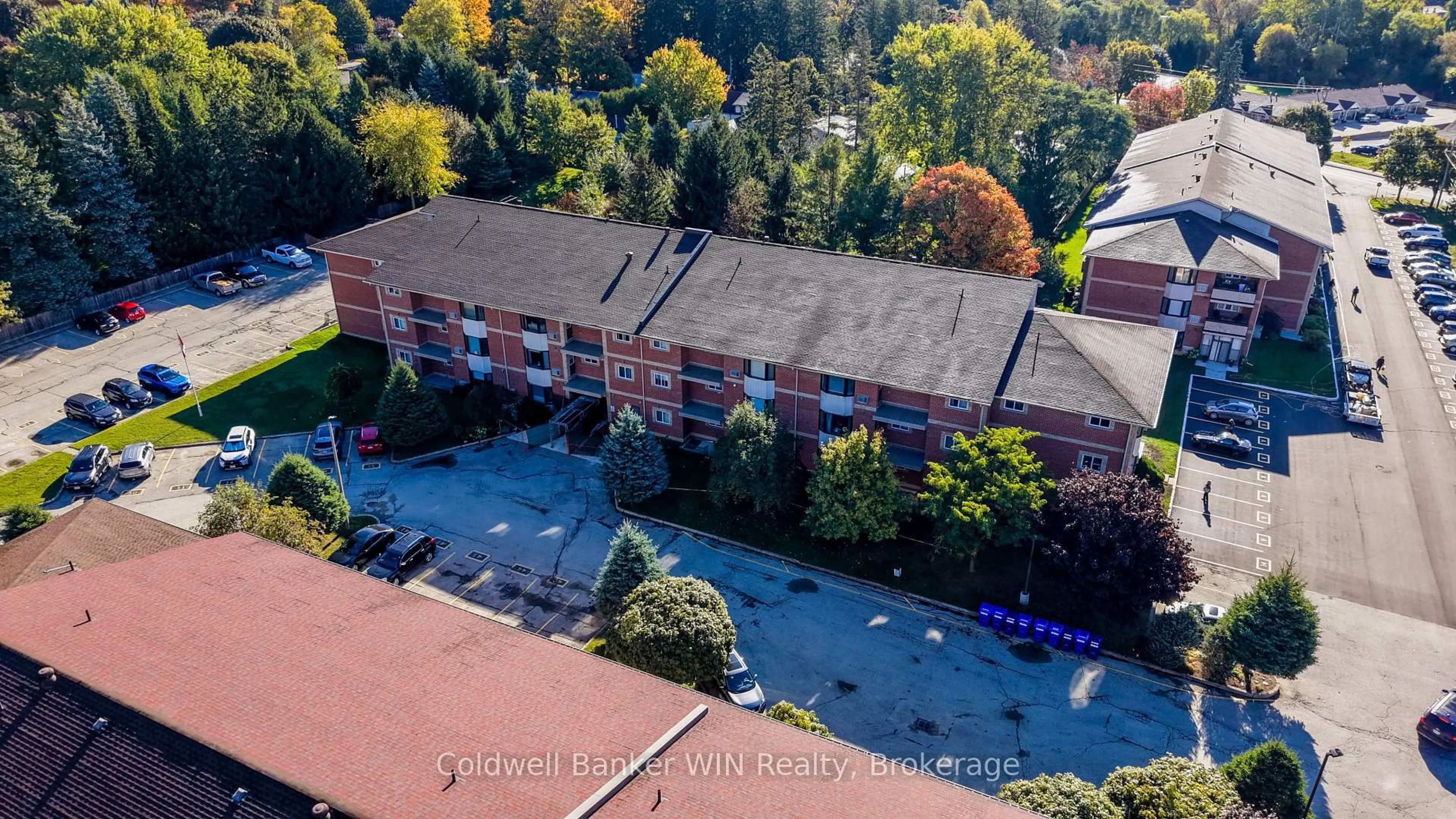 A pic from outside/outdoor area/front of a property/back of a property/a pic from drone, unknown for 440 DURHAM St #302, Wellington North Ontario N0G 2L2