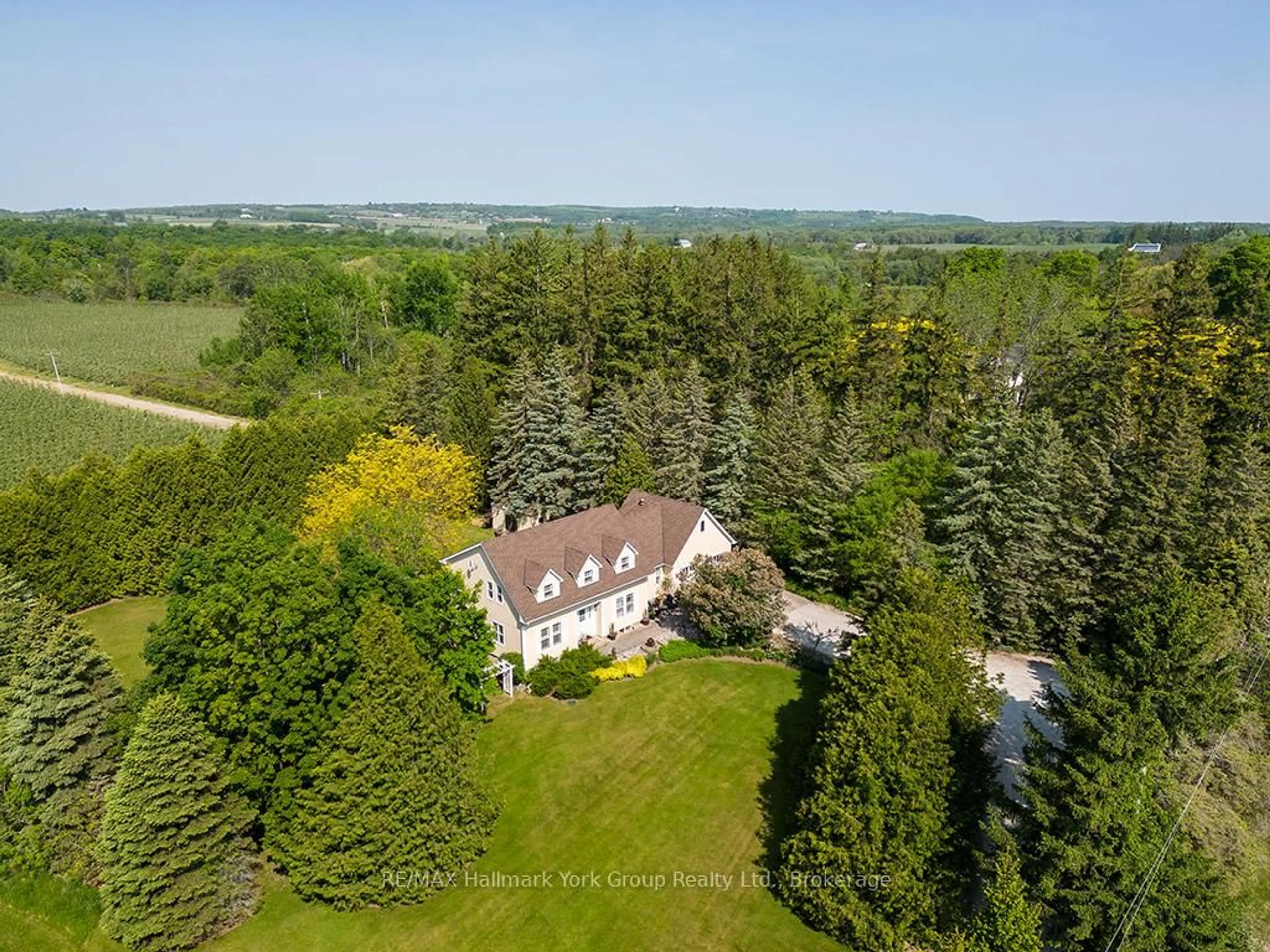 A pic from outside/outdoor area/front of a property/back of a property/a pic from drone, unknown for 788267 Grey 13 Rd, Blue Mountains Ontario N0H 1J0
