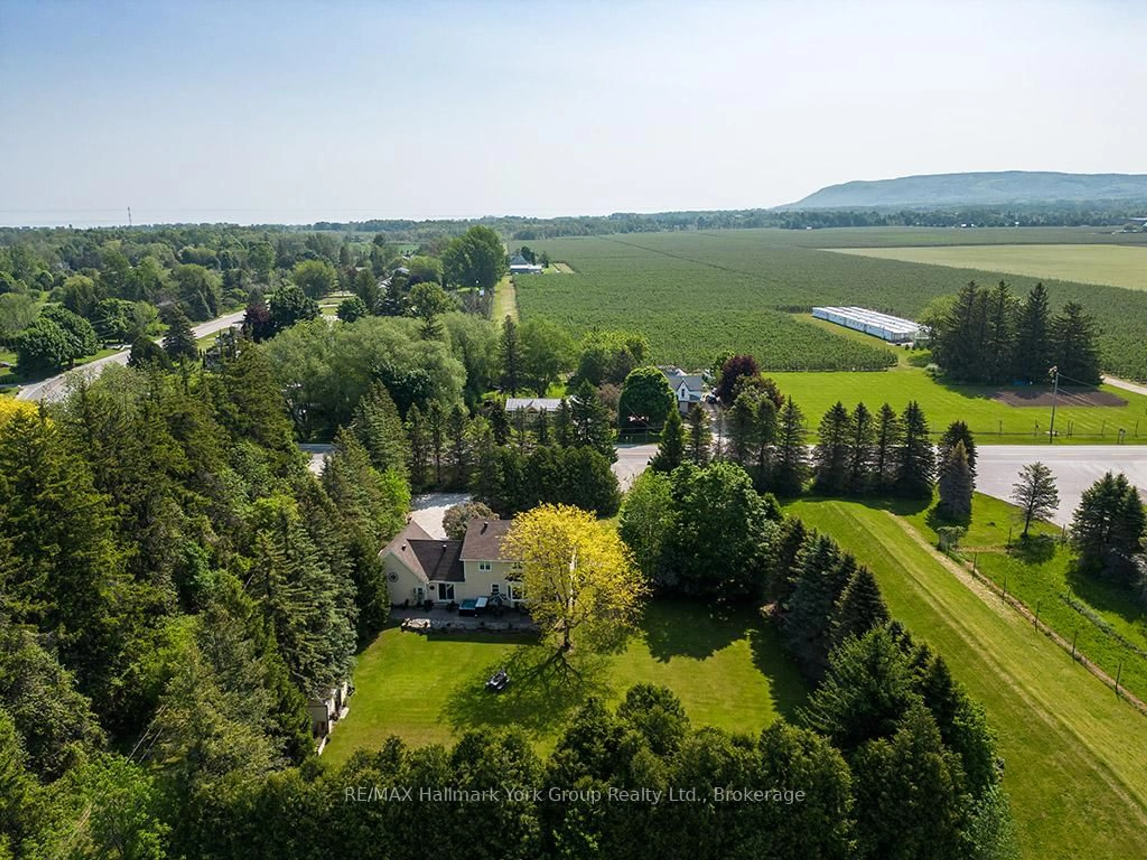 A pic from outside/outdoor area/front of a property/back of a property/a pic from drone, unknown for 788267 Grey 13 Rd, Blue Mountains Ontario N0H 1J0