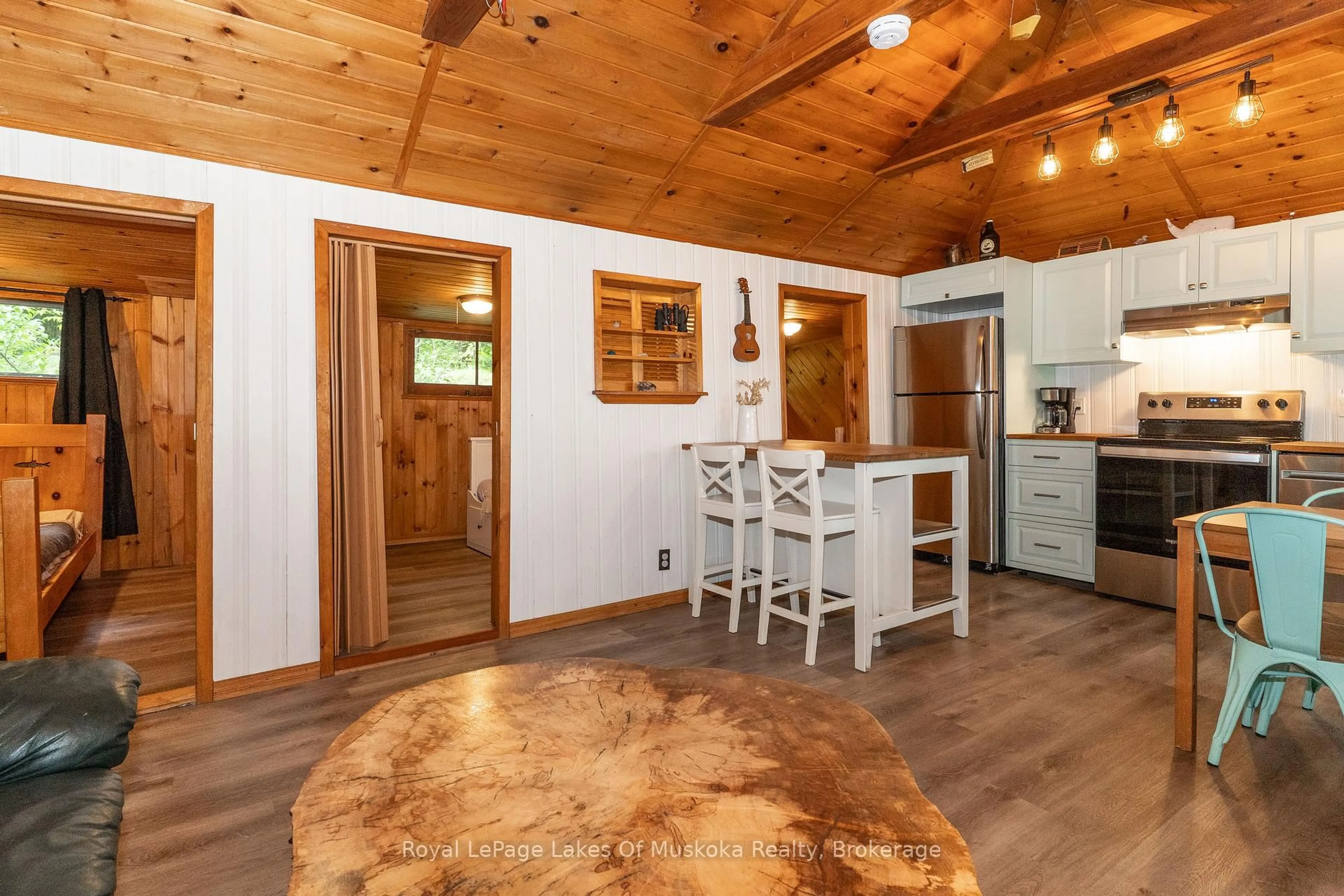 Open concept kitchen, wood/laminate floor for 1072 Long Lake Rd, Muskoka Lakes Ontario P0C 1A0