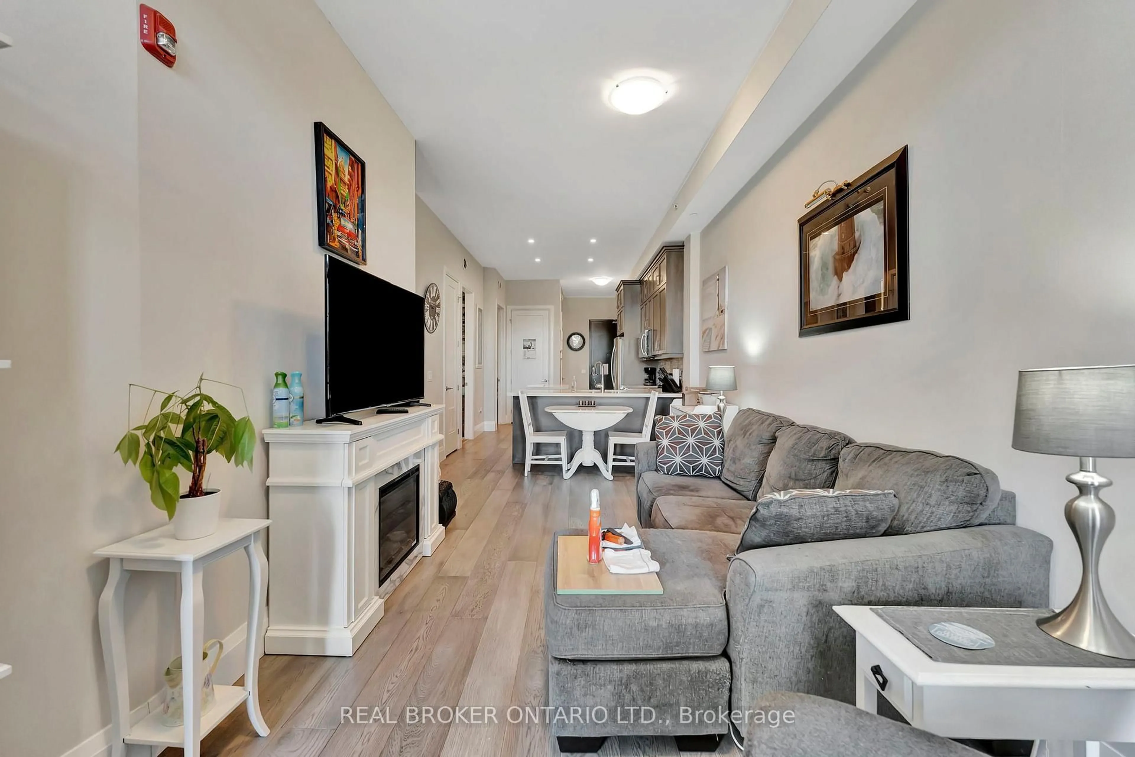 Living room with furniture, unknown for 85 Morrell St #117, Brantford Ontario N3T 4J6