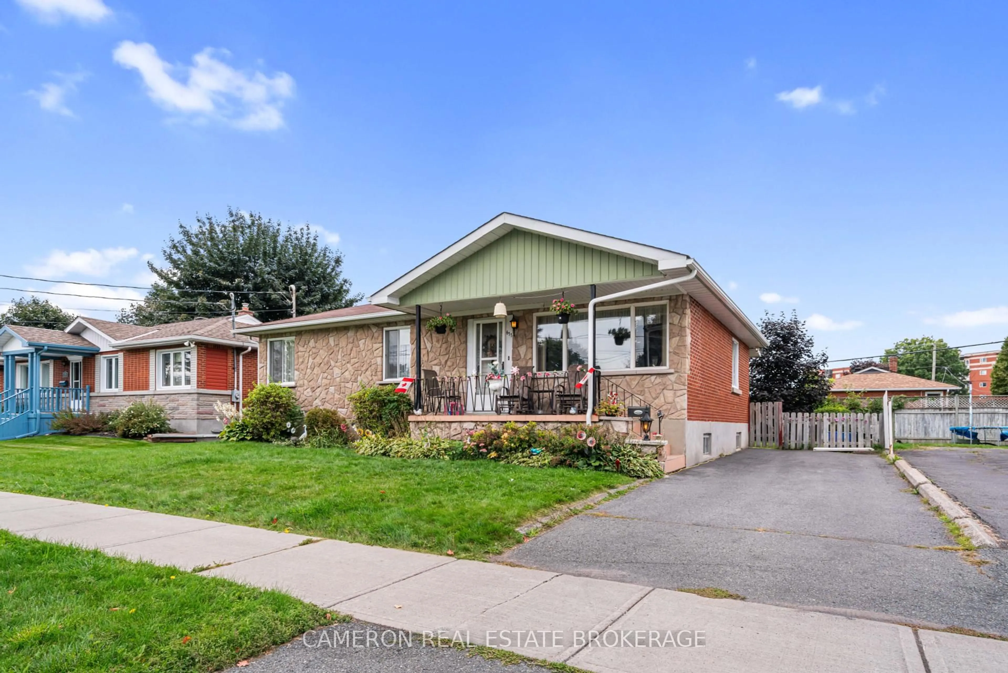 Home with brick exterior material, street for 611 Carleton St, Cornwall Ontario K6H 4Y4