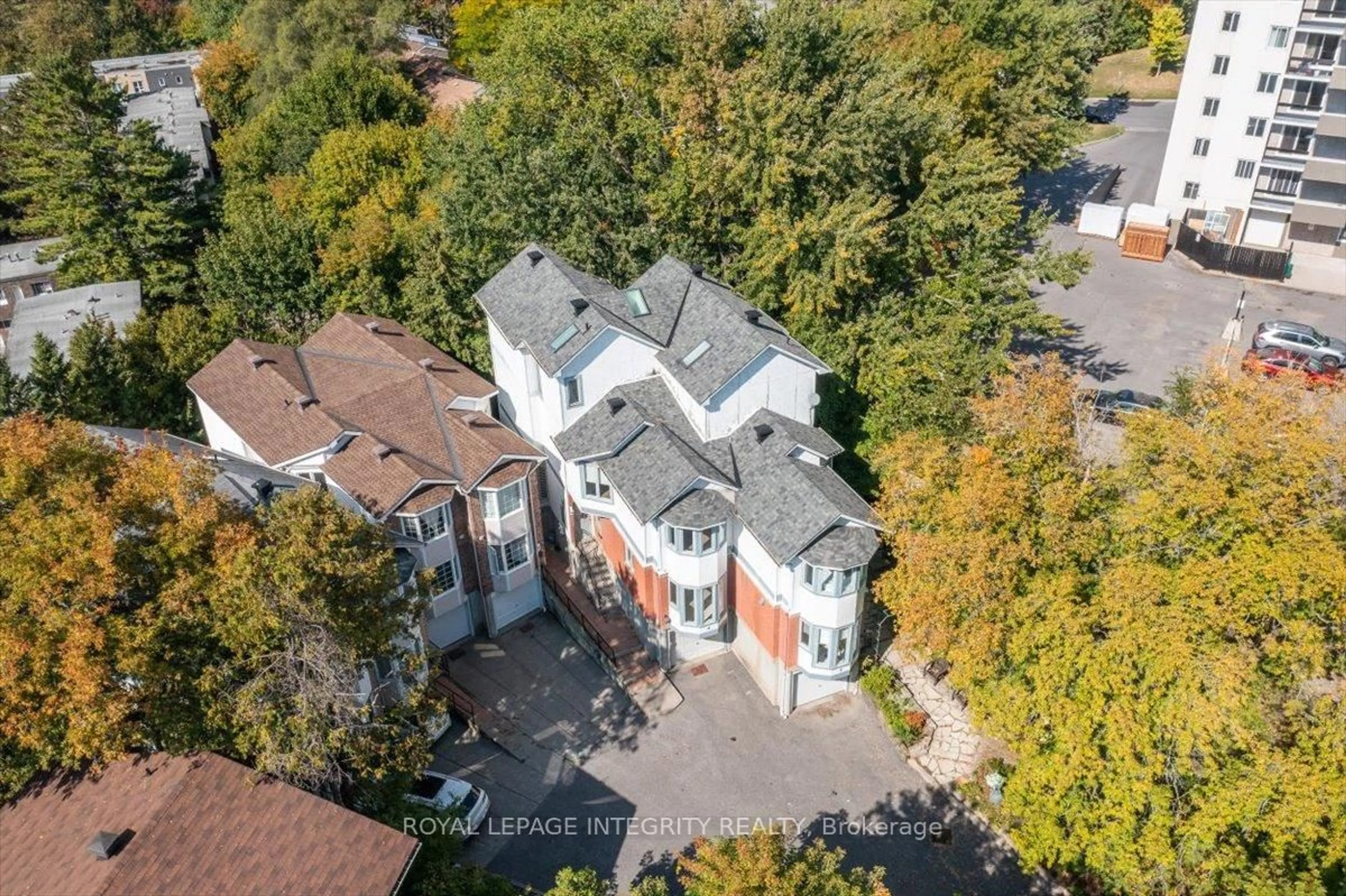 A pic from outside/outdoor area/front of a property/back of a property/a pic from drone, street for 2949 Richmond Rd #4, Ottawa Ontario K2B 6S6