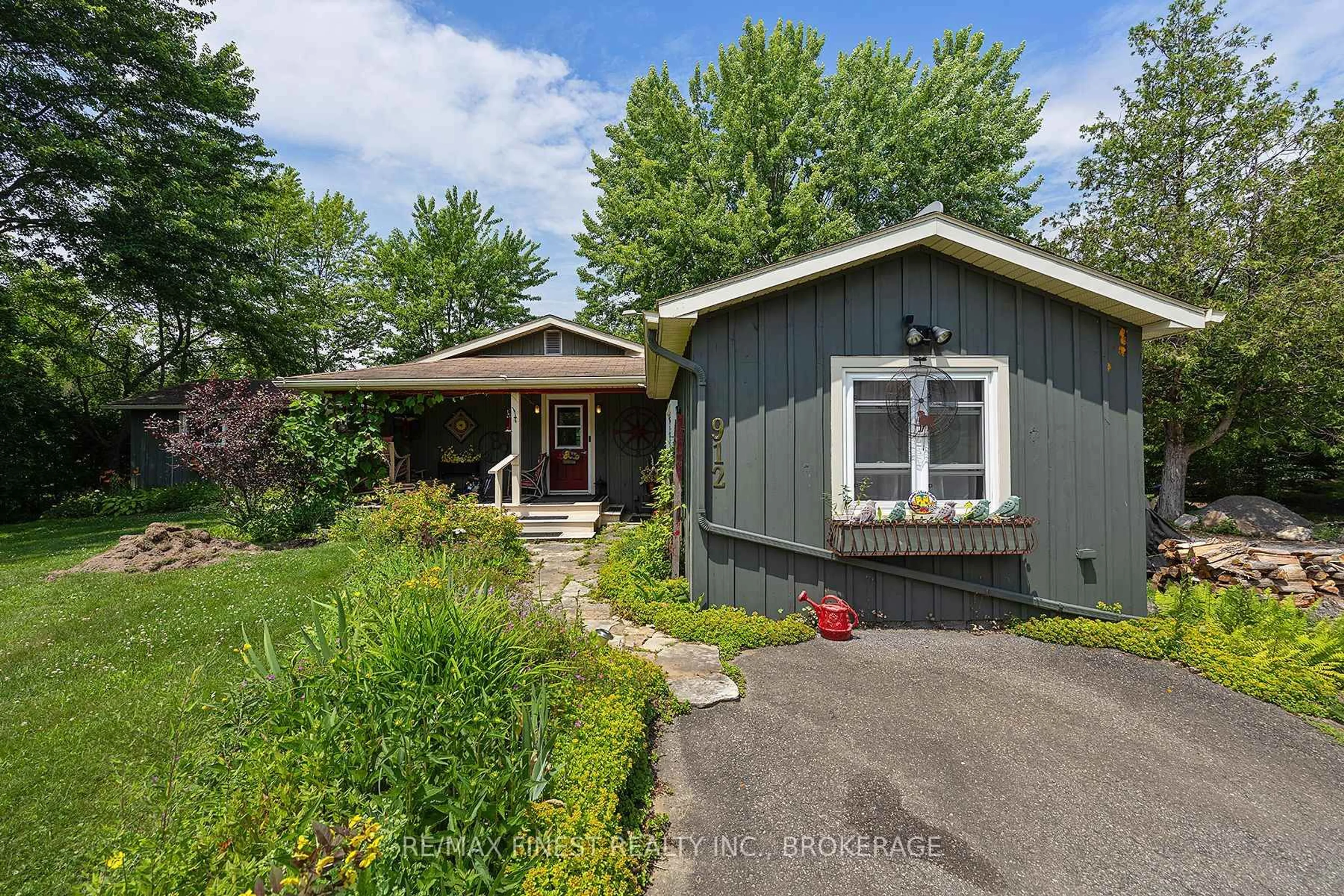 A pic from outside/outdoor area/front of a property/back of a property/a pic from drone, street for 912 Moonlight Lane, Lansdowne Village Ontario K0E 1L0