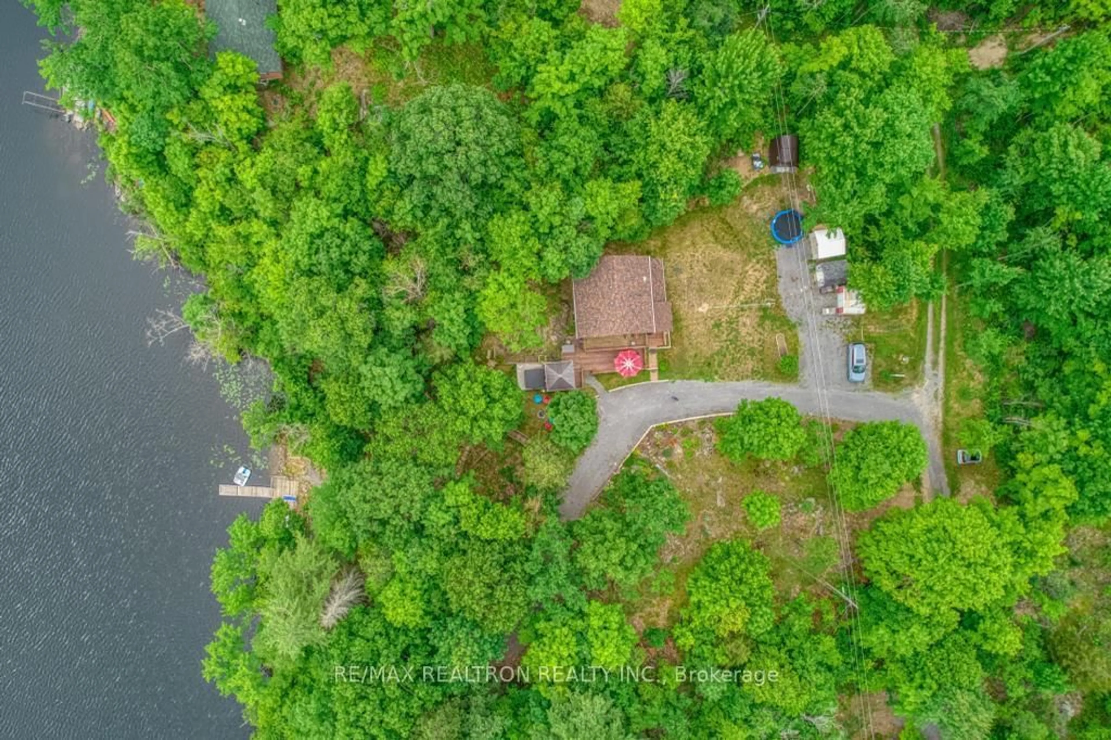 A pic from outside/outdoor area/front of a property/back of a property/a pic from drone, water/lake/river/ocean view for 1073 Freeman Lane, Godfrey Ontario K0H 1T0