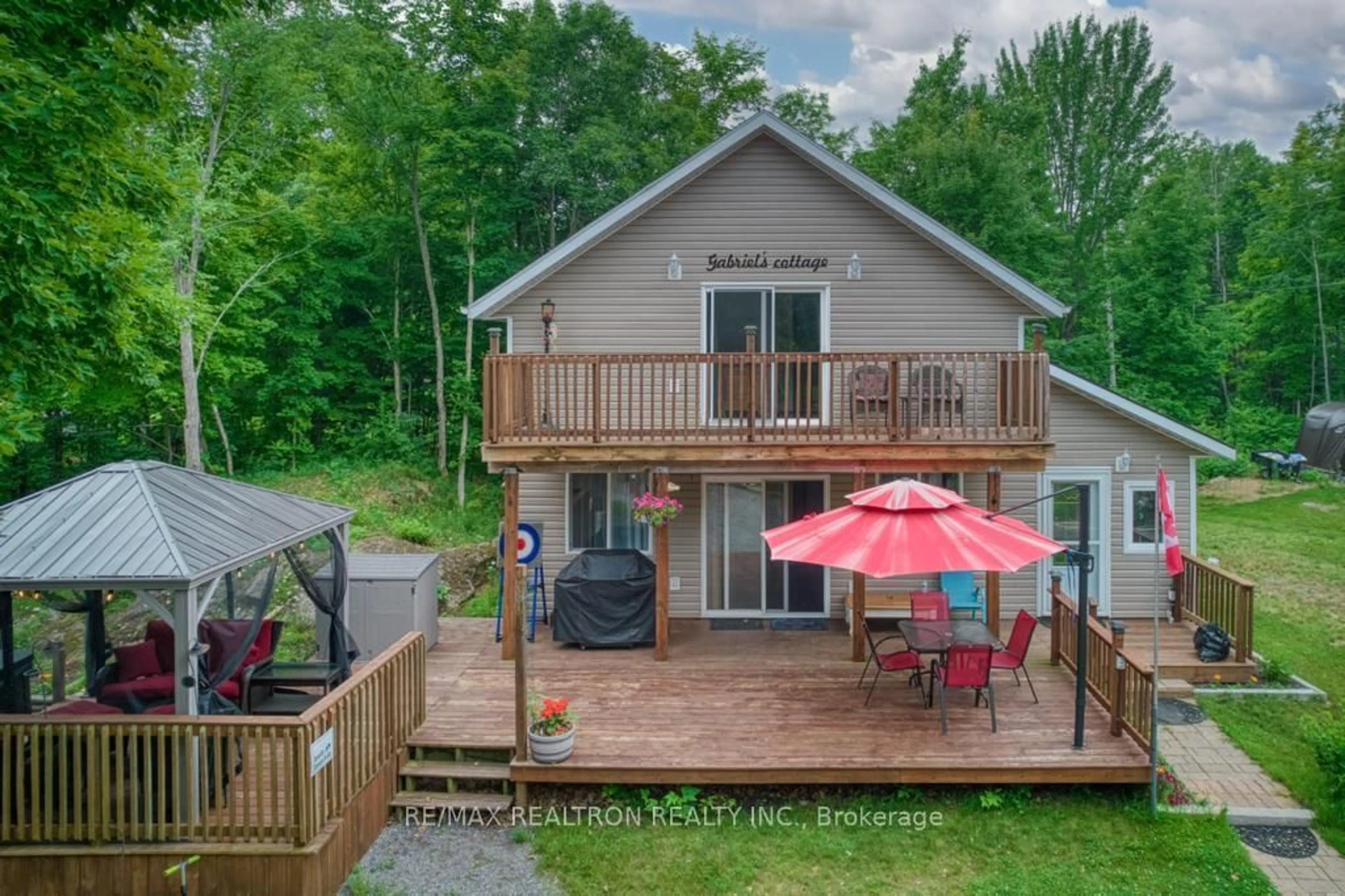 A pic from outside/outdoor area/front of a property/back of a property/a pic from drone, water/lake/river/ocean view for 1073 Freeman Lane, Godfrey Ontario K0H 1T0
