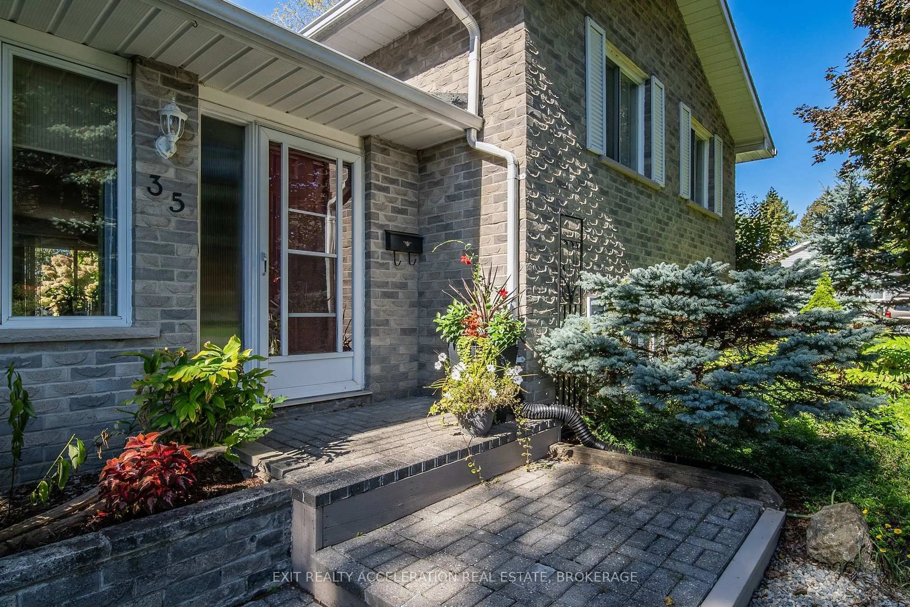 Home with brick exterior material, street for 35 Riverview Dr, Greater Napanee Ontario K7R 3A1