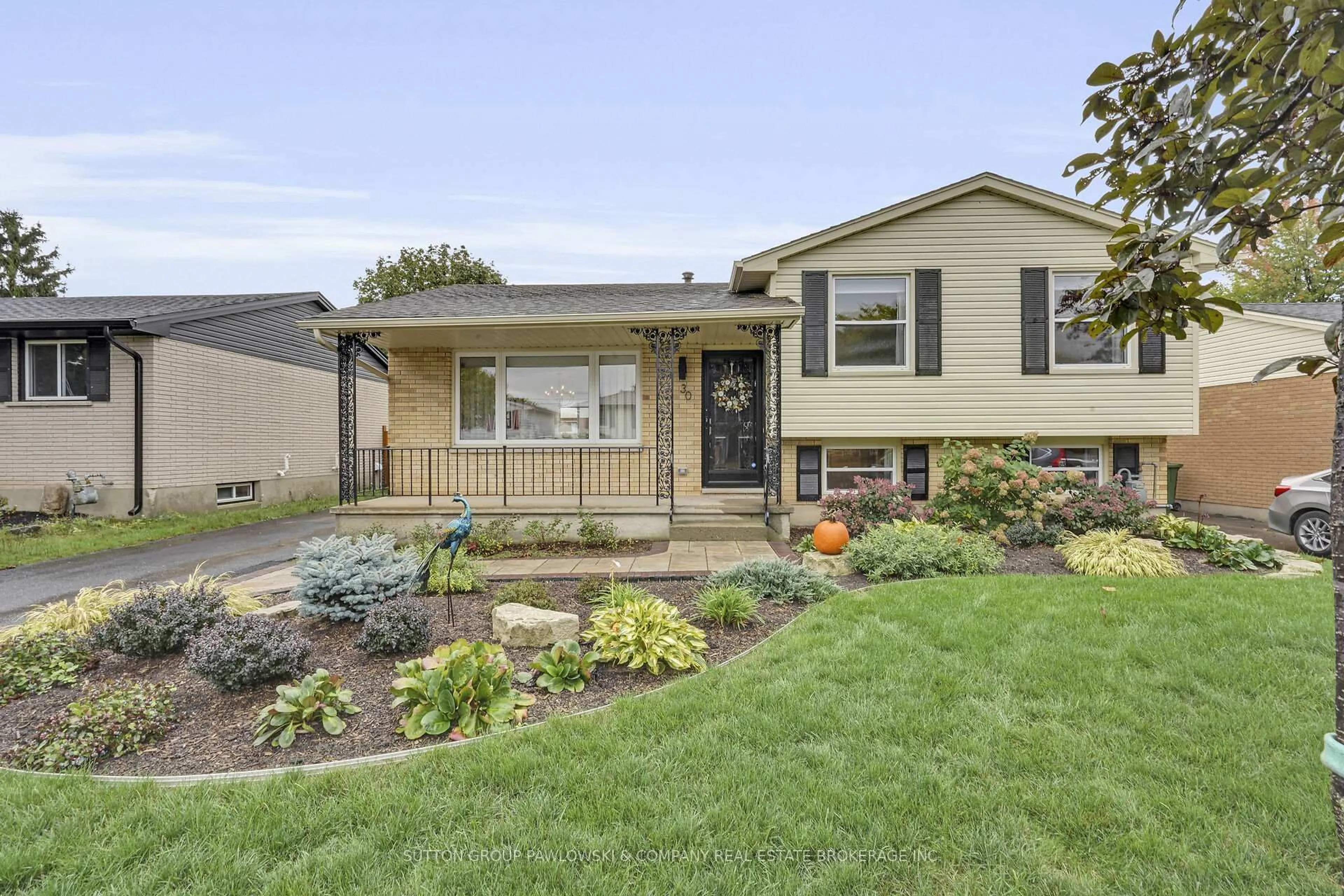 Home with vinyl exterior material, street for 30 Leger Ave, St. Thomas Ontario N5R 5M3