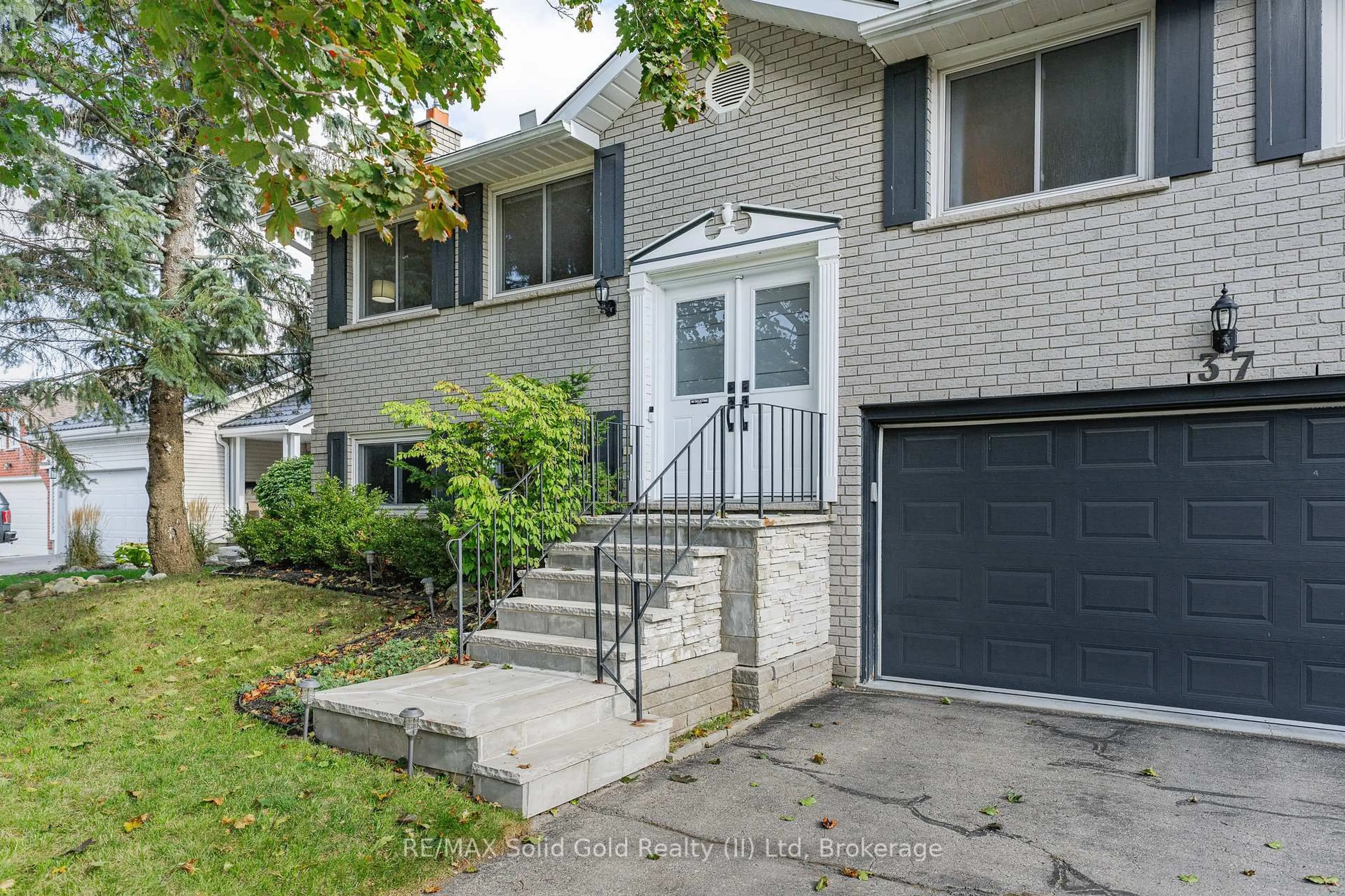 Home with brick exterior material, street for 37 Thornhill Dr, Guelph Ontario N1H 8B6