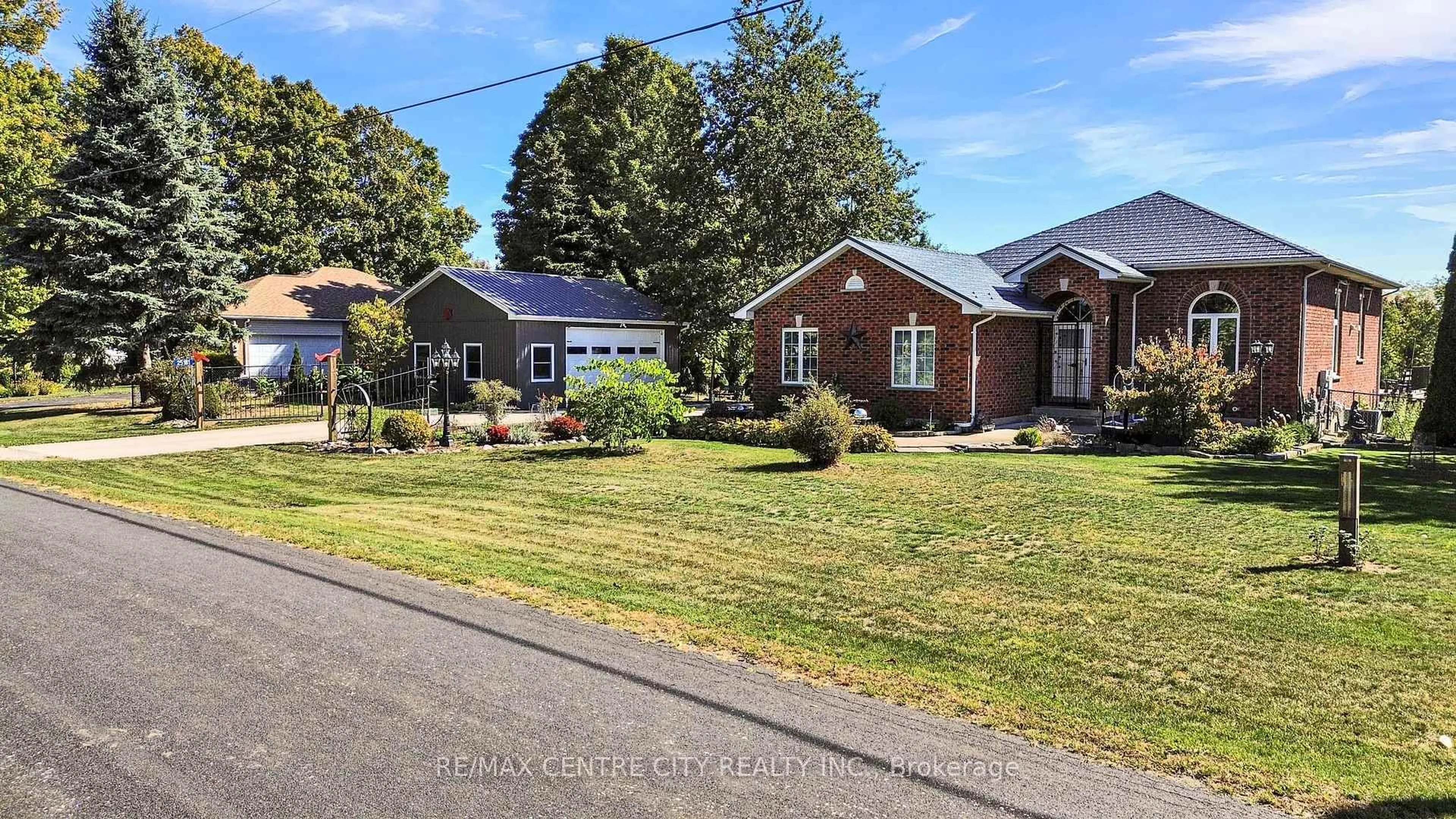 A pic from outside/outdoor area/front of a property/back of a property/a pic from drone, street for 25181 Gray Line, West Elgin Ontario N0L 2P0