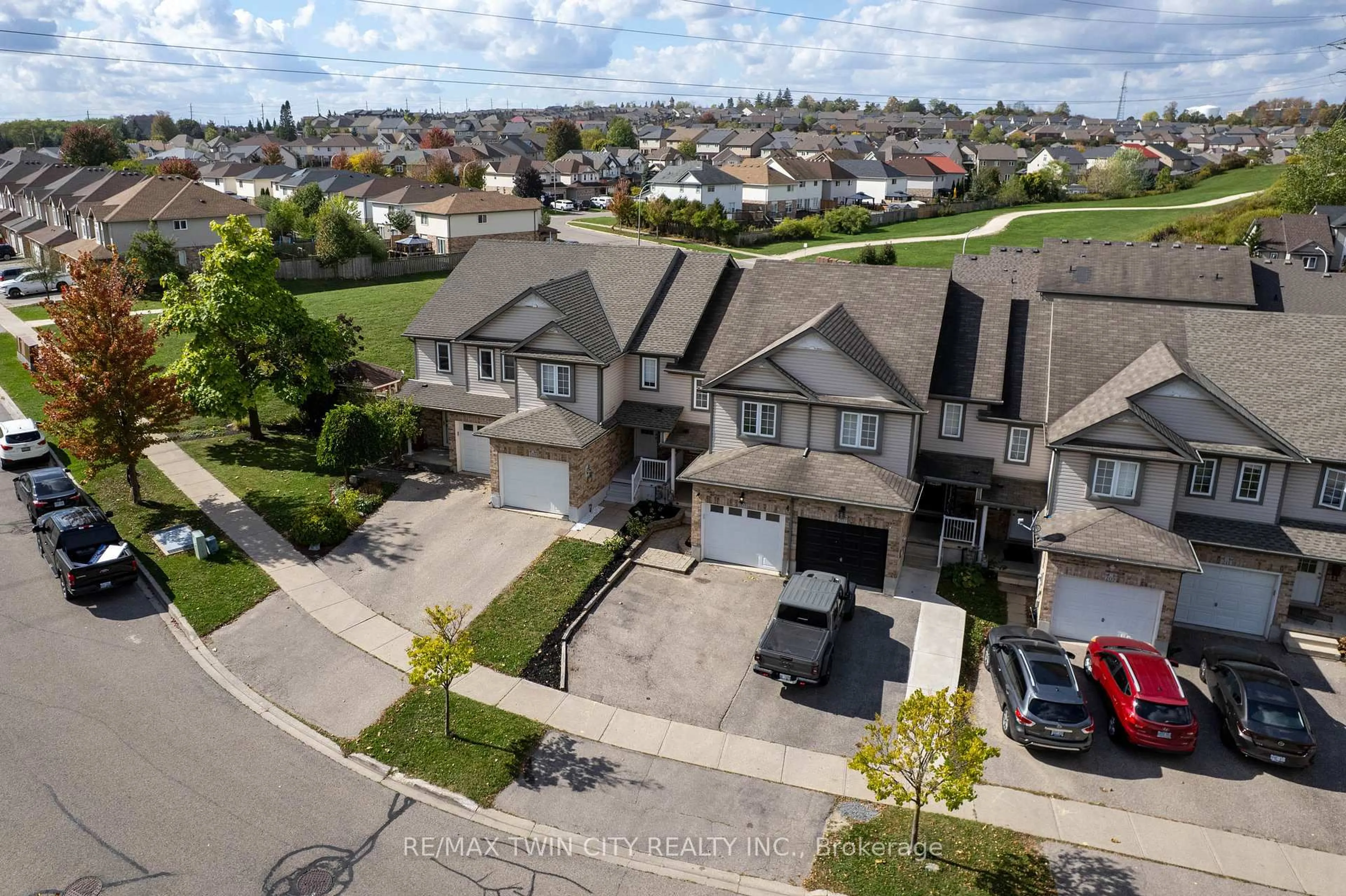 A pic from outside/outdoor area/front of a property/back of a property/a pic from drone, street for 205 Snowdrop Cres, Kitchener Ontario N2E 4G9