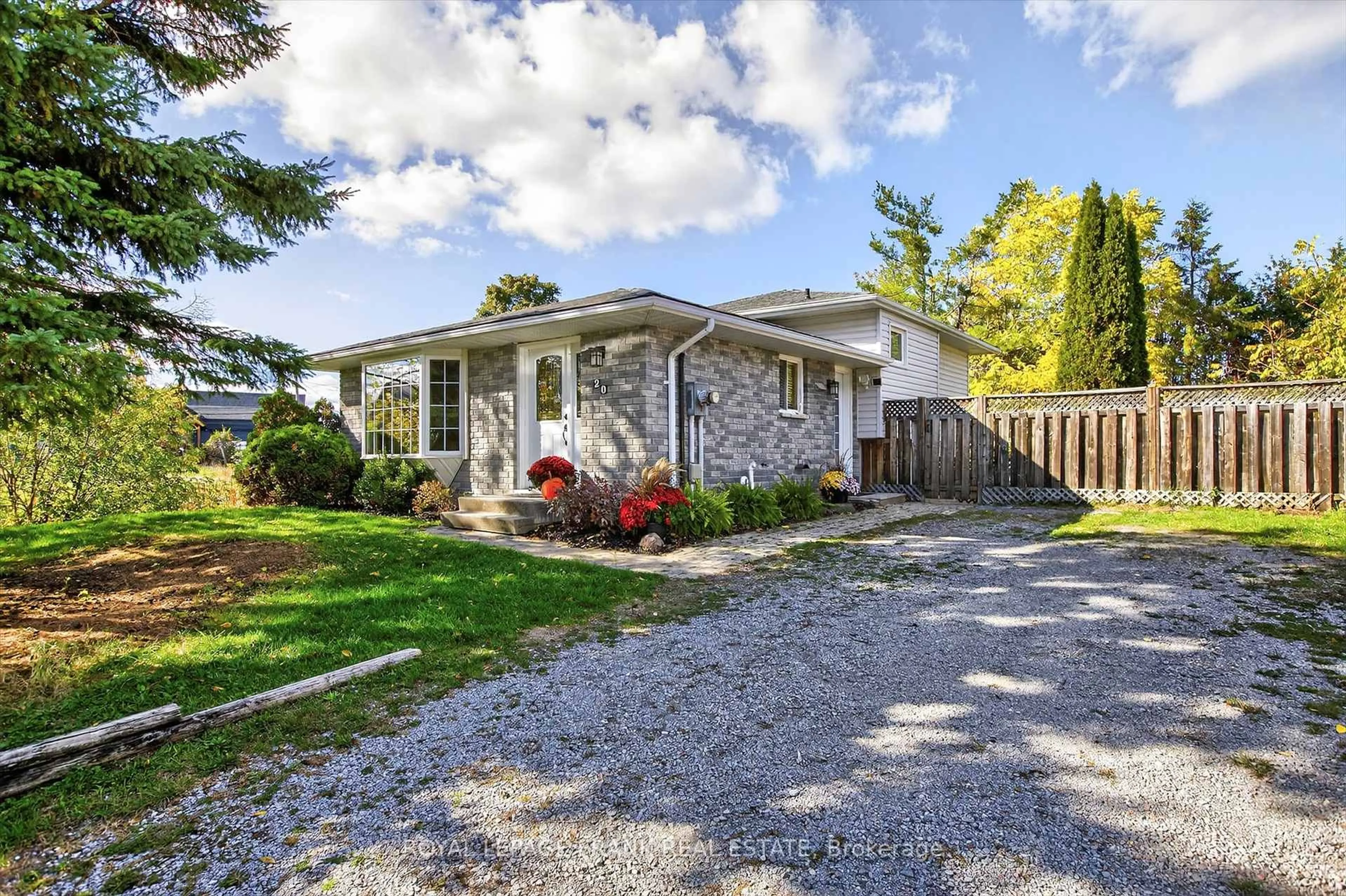 Home with vinyl exterior material, street for 20 Colbourne St St, Selwyn Ontario K0L 2H0