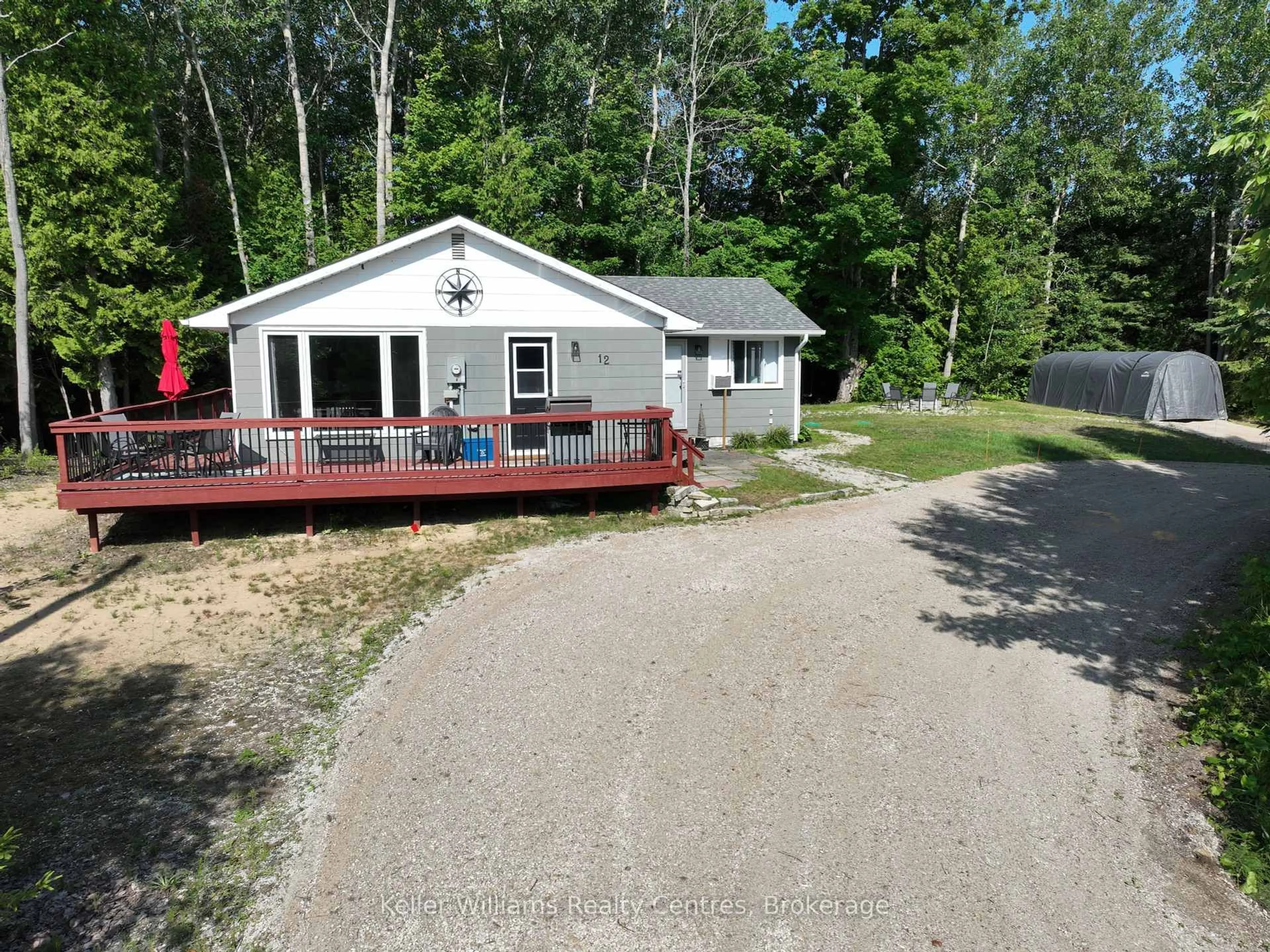 A pic from outside/outdoor area/front of a property/back of a property/a pic from drone, unknown for 12 Pierce St, South Bruce Peninsula Ontario N0H 2T0