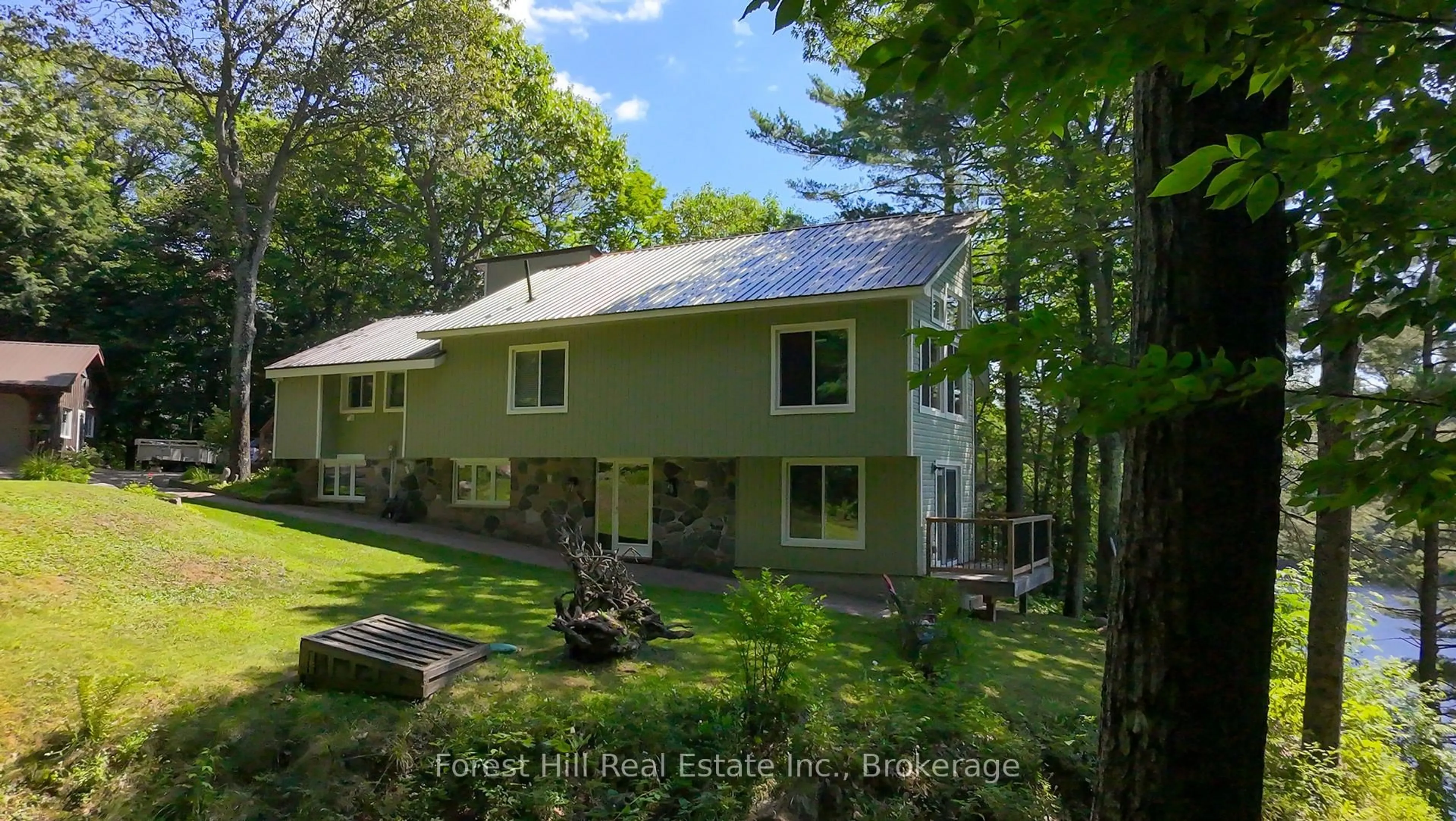 A pic from outside/outdoor area/front of a property/back of a property/a pic from drone, forest/trees view for 1289 Delbrooke Rd, Lake of Bays Ontario P0H 1H0