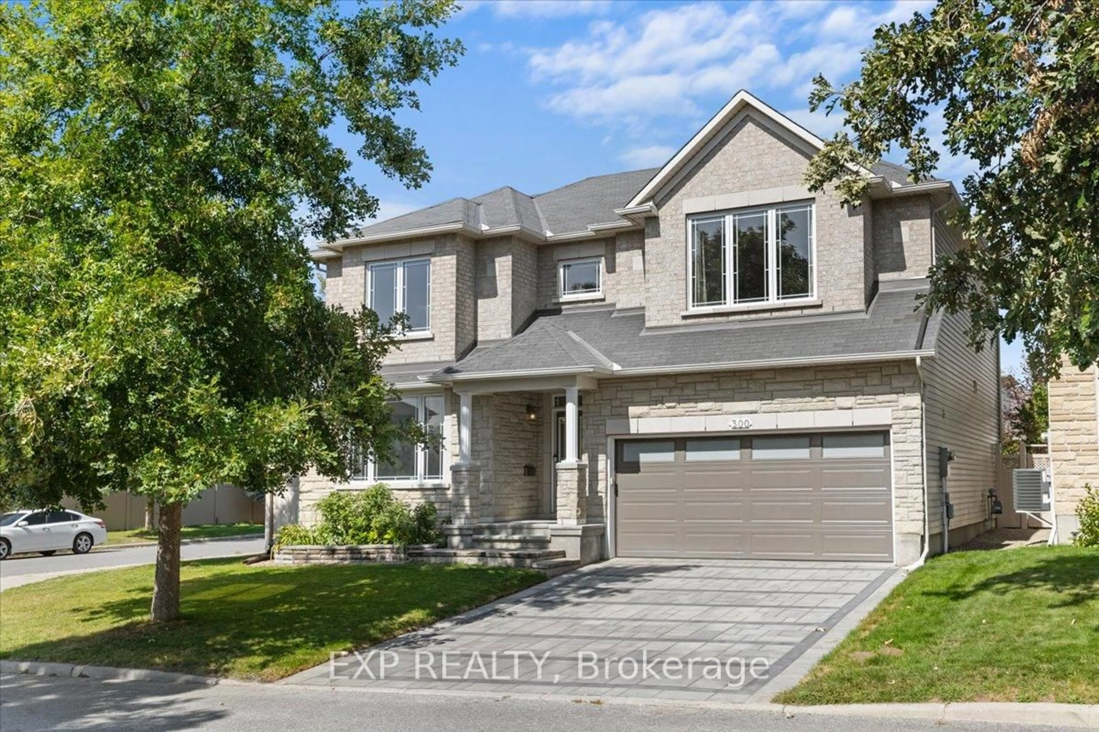 Home with brick exterior material, street for 300 Grayburn Way, Ottawa Ontario K2J 0V8