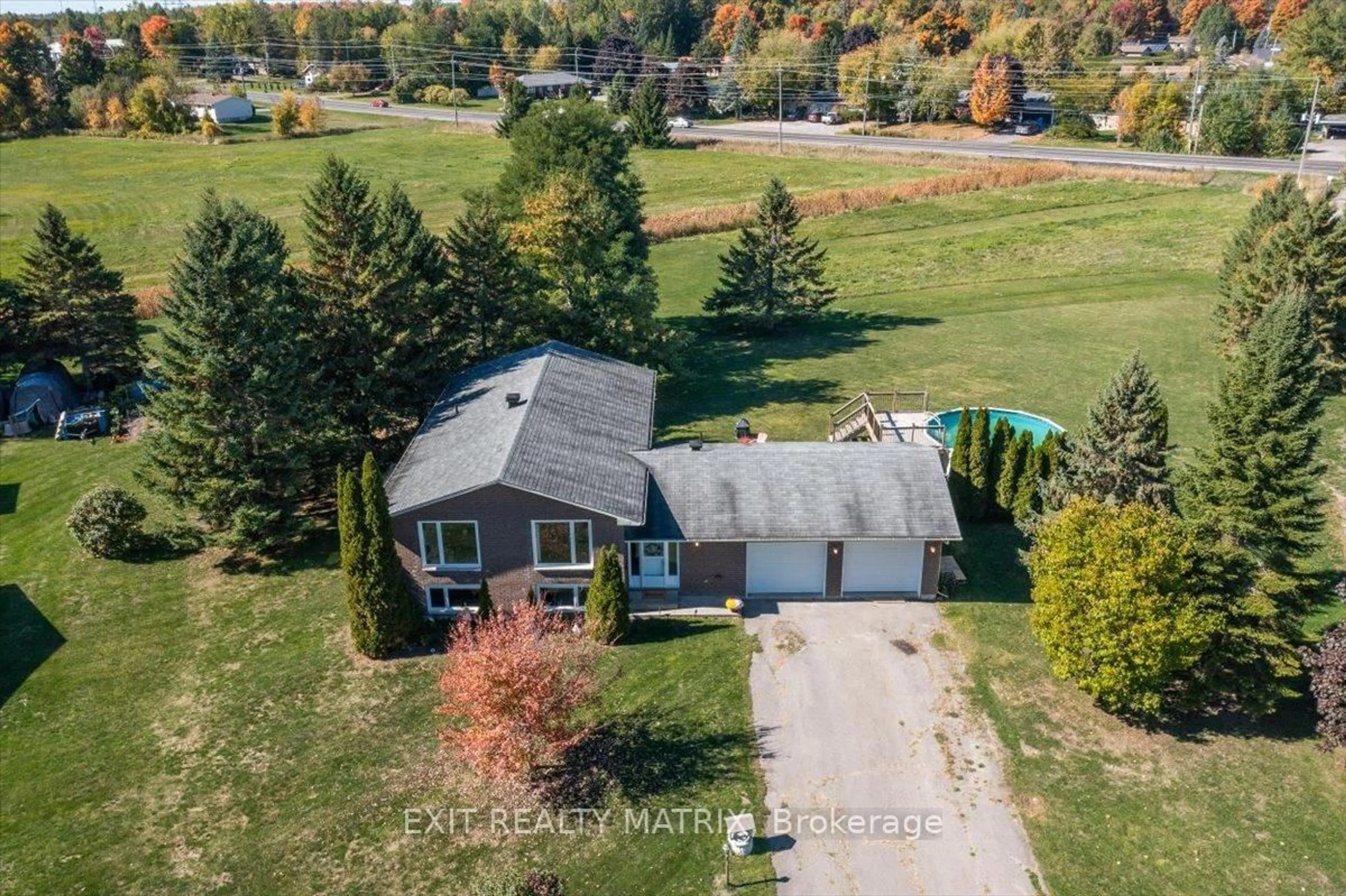 A pic from outside/outdoor area/front of a property/back of a property/a pic from drone, unknown for 8089 LAURIE Lane, Metcalfe Ontario K0A 2P0