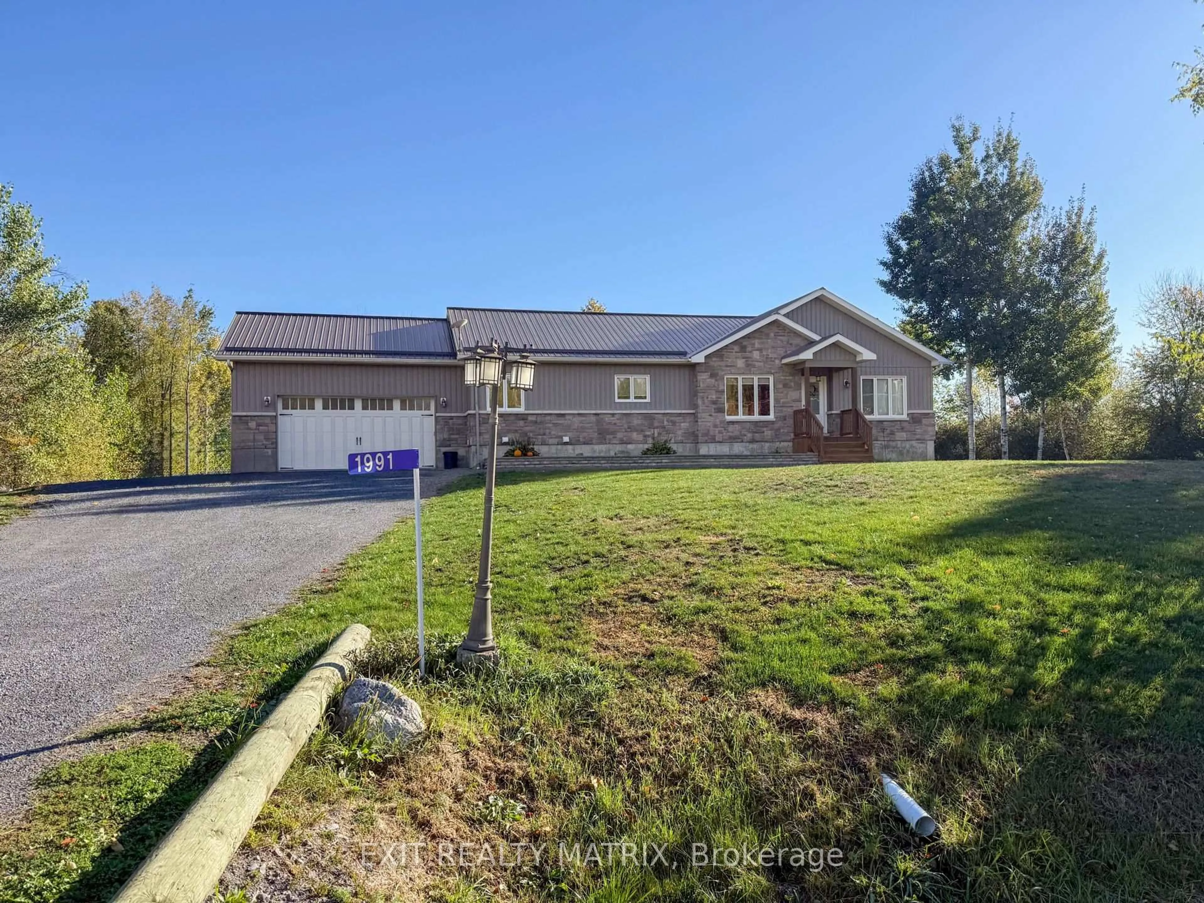 A pic from outside/outdoor area/front of a property/back of a property/a pic from drone, unknown for 1991 Thibault Crt, North Dundas Ontario K0C 1H0