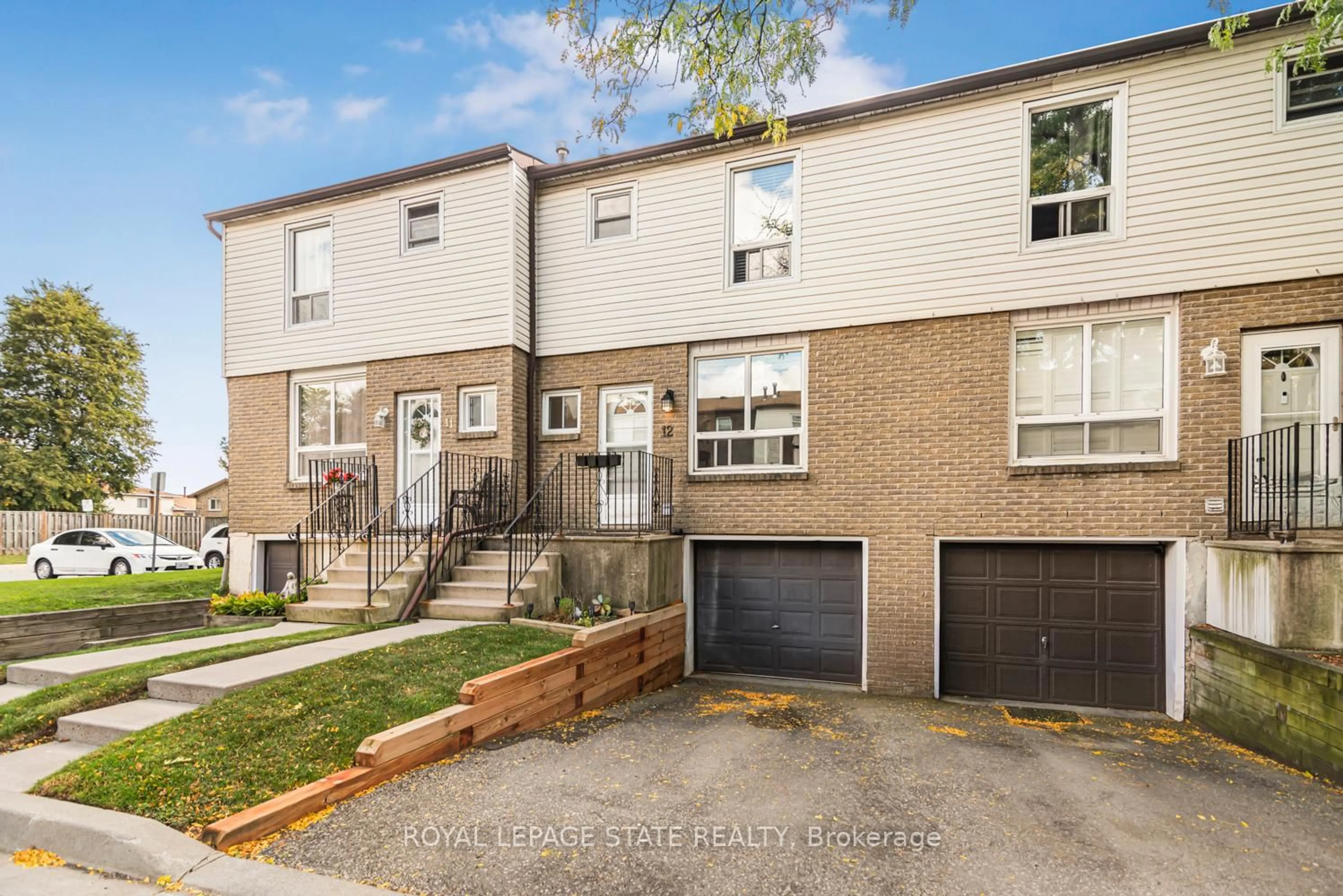 Home with brick exterior material, street for 1301 Upper Gage St #12, Hamilton Ontario L8W 1E5