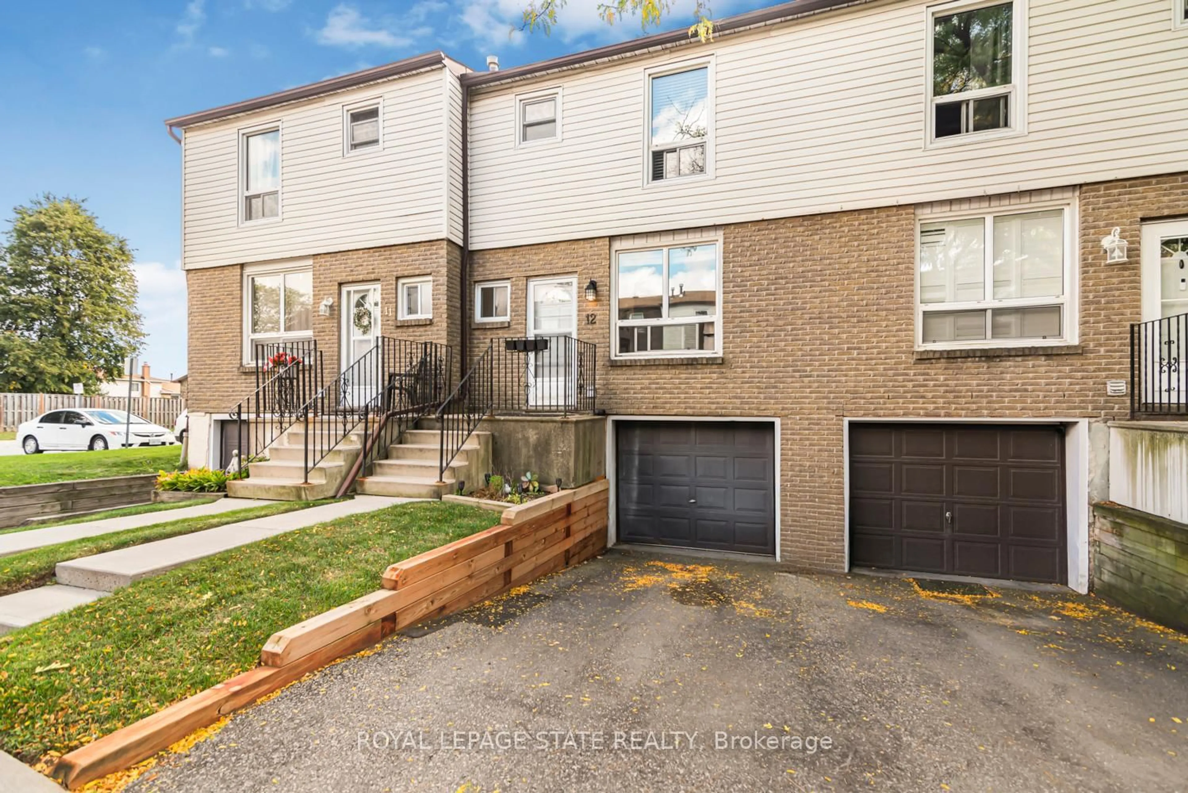 Home with brick exterior material, street for 1301 Upper Gage St #12, Hamilton Ontario L8W 1E5