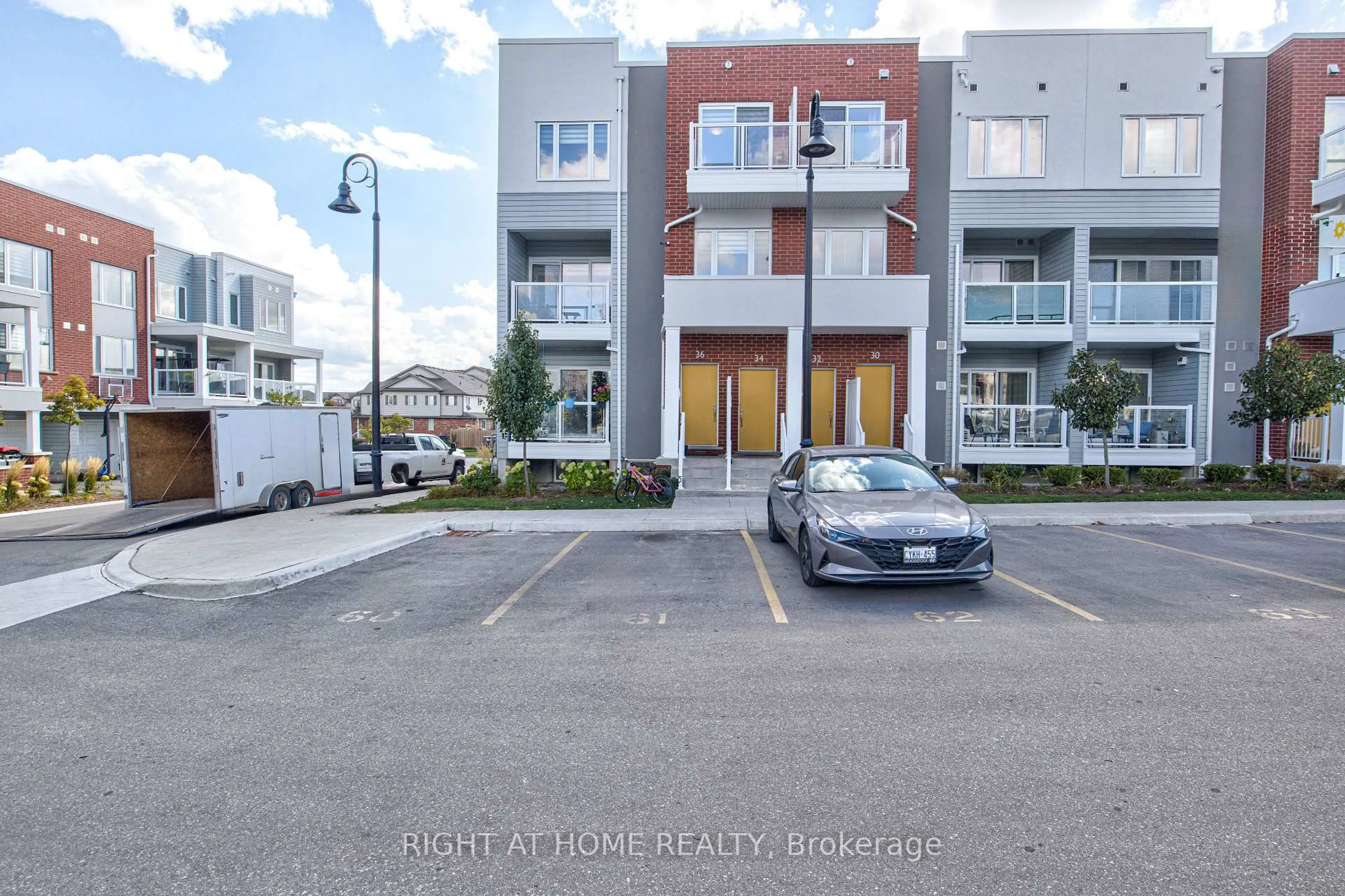 A pic from outside/outdoor area/front of a property/back of a property/a pic from drone, street for 34 Vitality Dr, Kitchener Ontario N2R 0R7