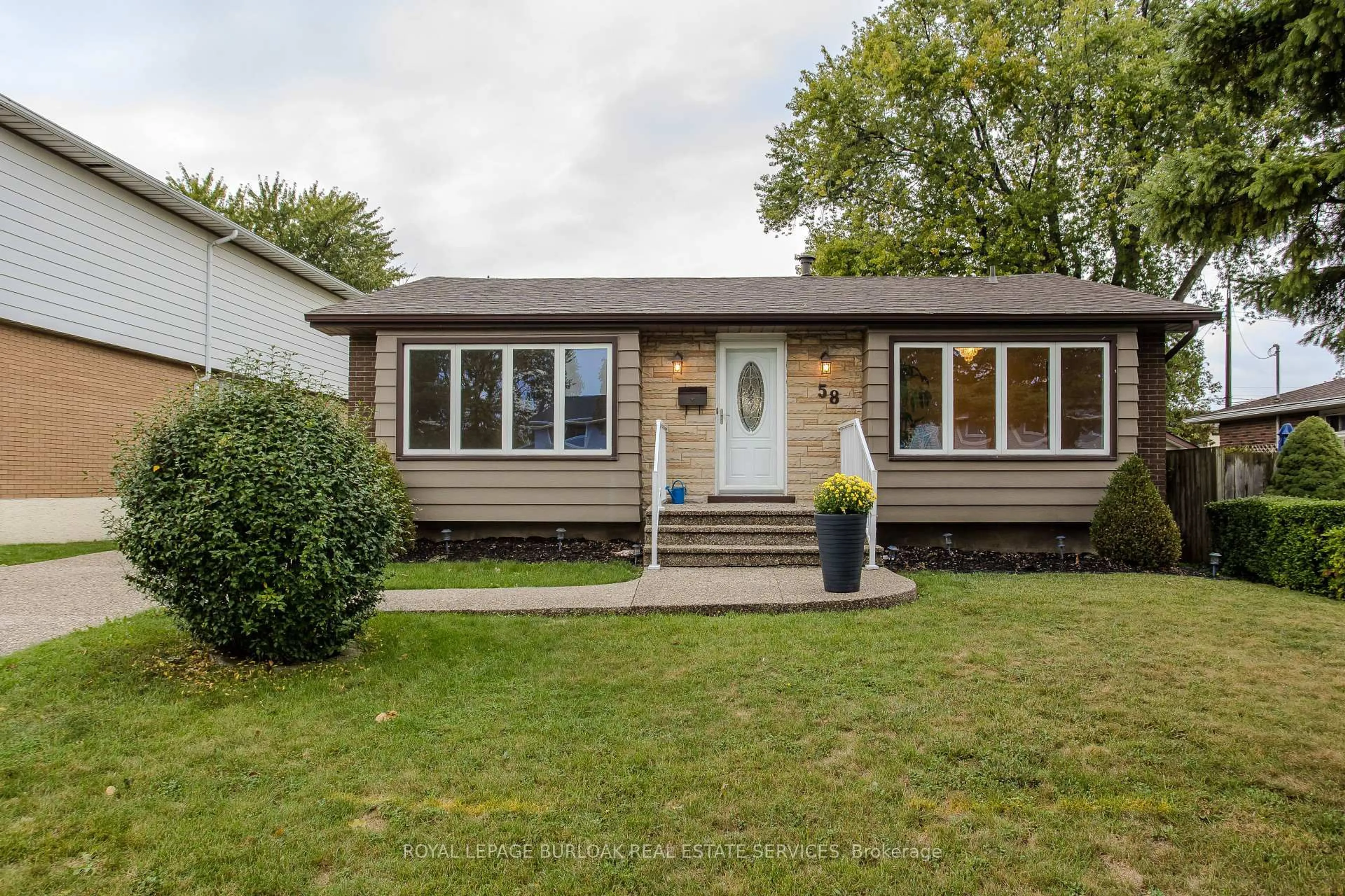 Home with vinyl exterior material, street for 58 Goldfinch Rd, Hamilton Ontario L9A 3W7