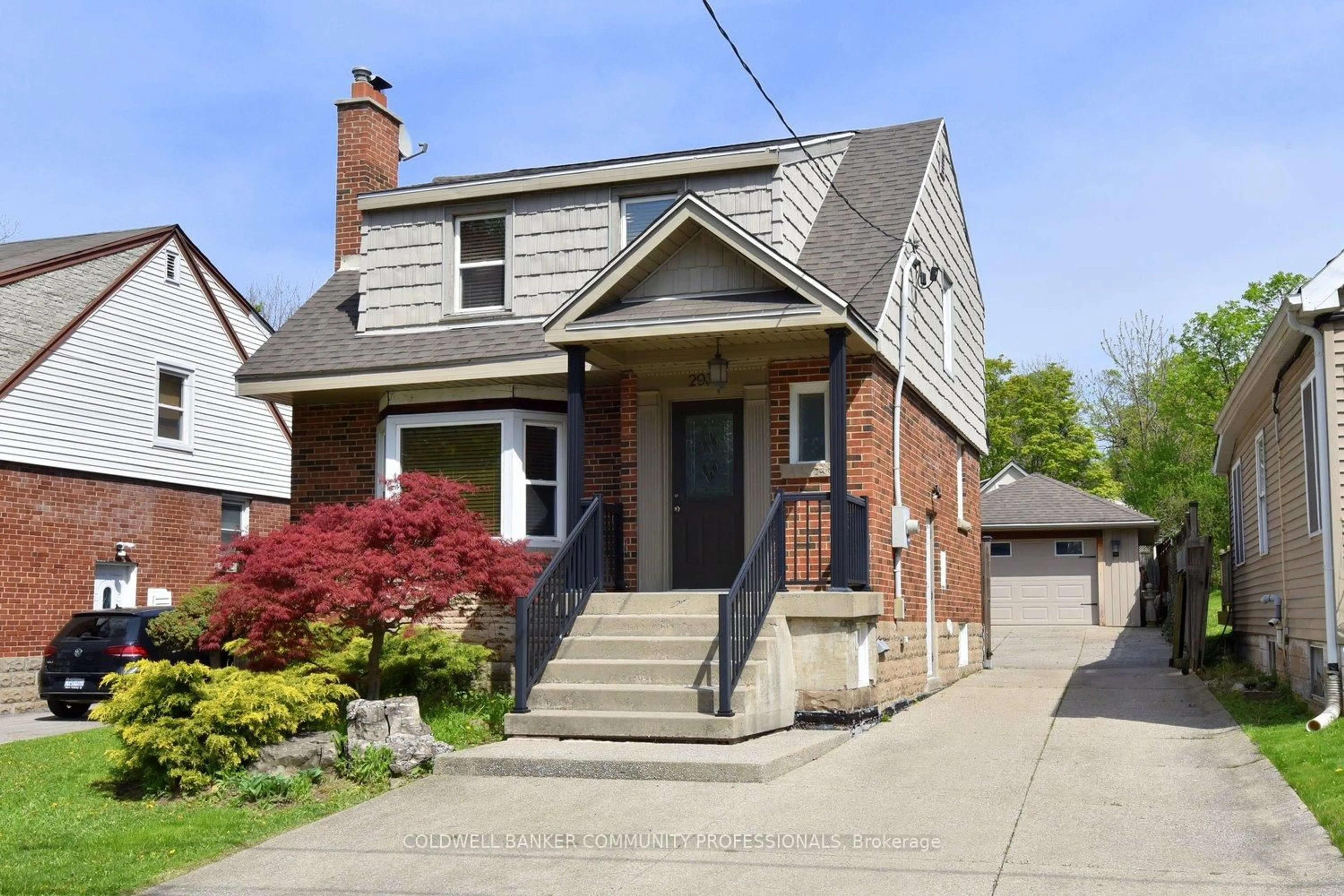 Home with brick exterior material, street for 293 Emerson St, Hamilton Ontario L8S 2Y8