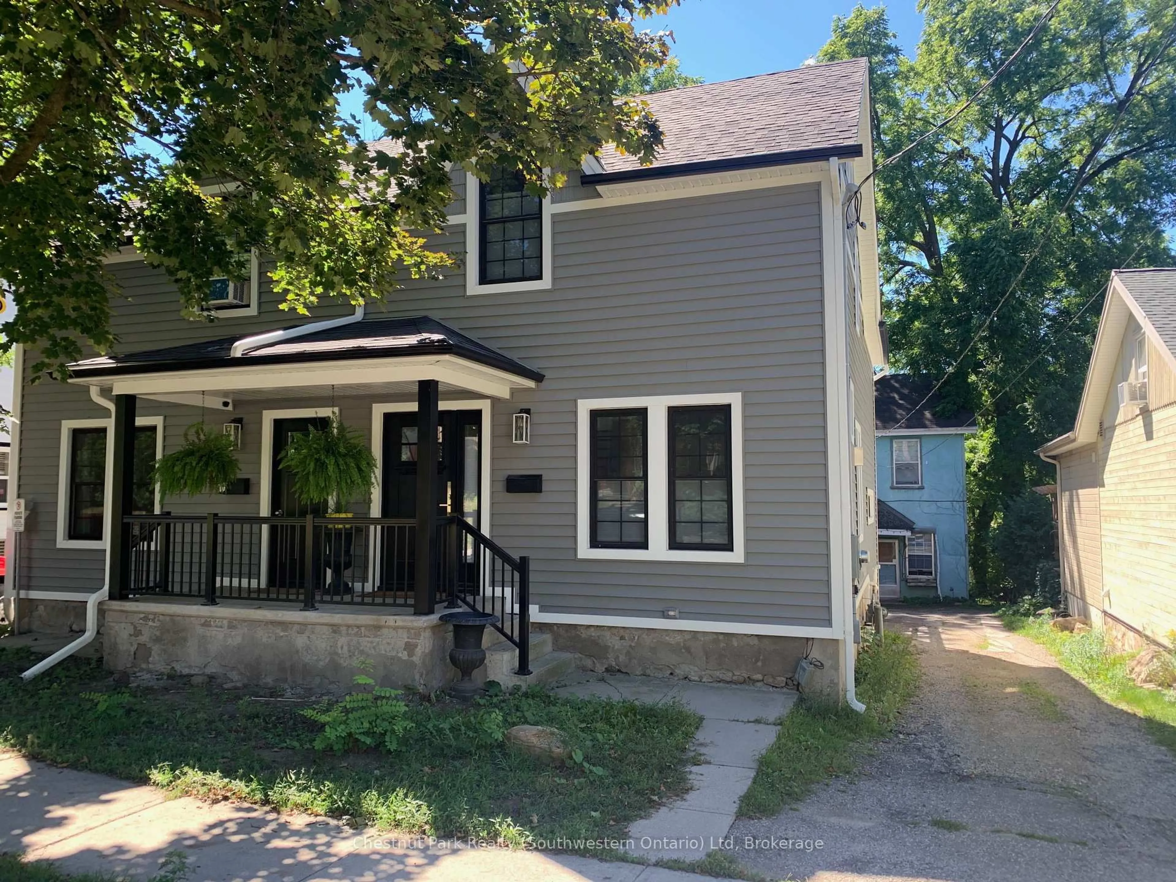 Home with vinyl exterior material, street for 114-116 Arthur St, Guelph Ontario N1E 4V2