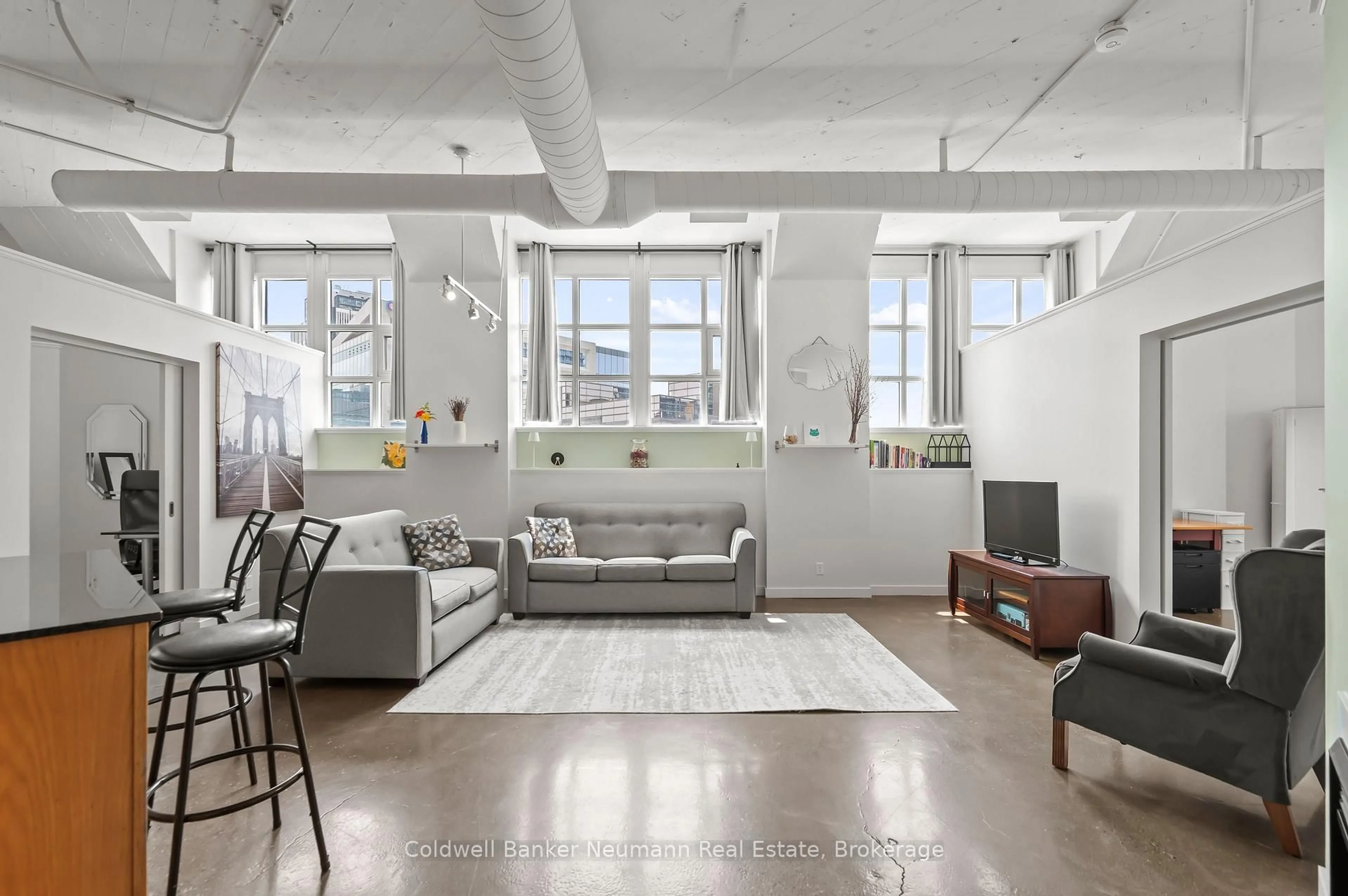 Living room with furniture, unknown for 404 King Street West St #308, Kitchener Ontario N2G 2L5