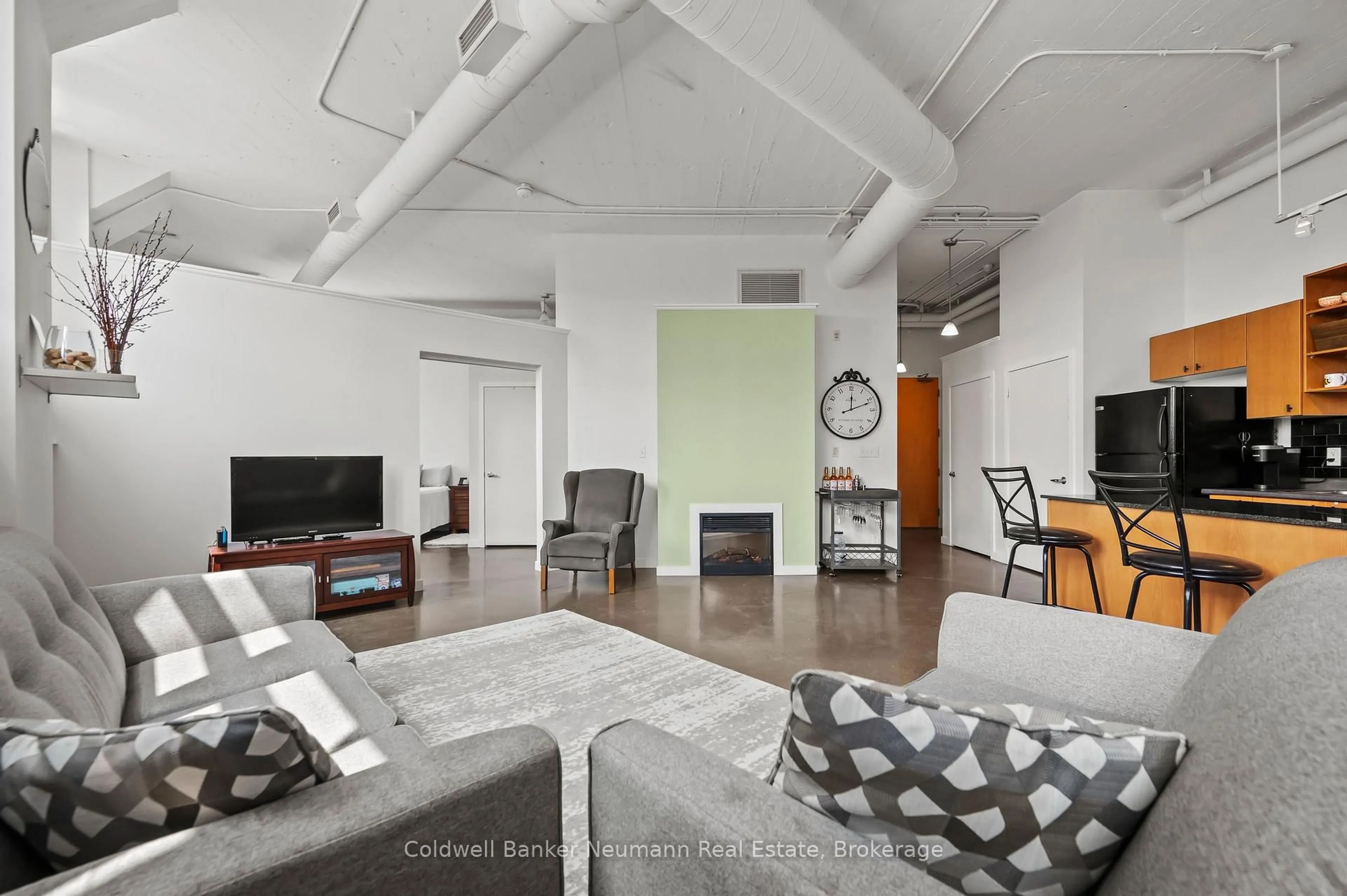 Living room with furniture, unknown for 404 King Street West St #308, Kitchener Ontario N2G 2L5