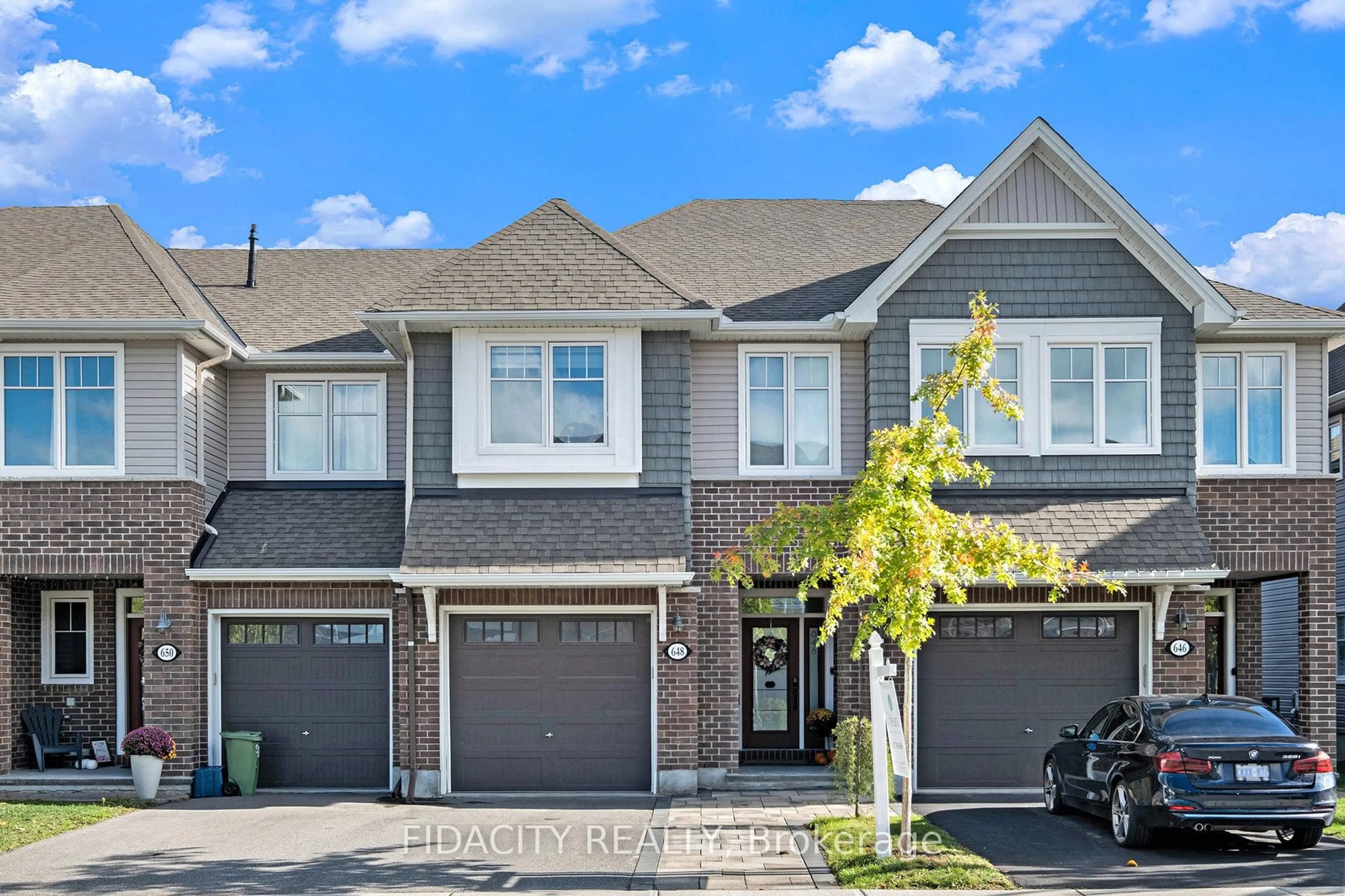 Home with brick exterior material, street for 648 Vivera Pl, Ottawa Ontario K2S 2N1