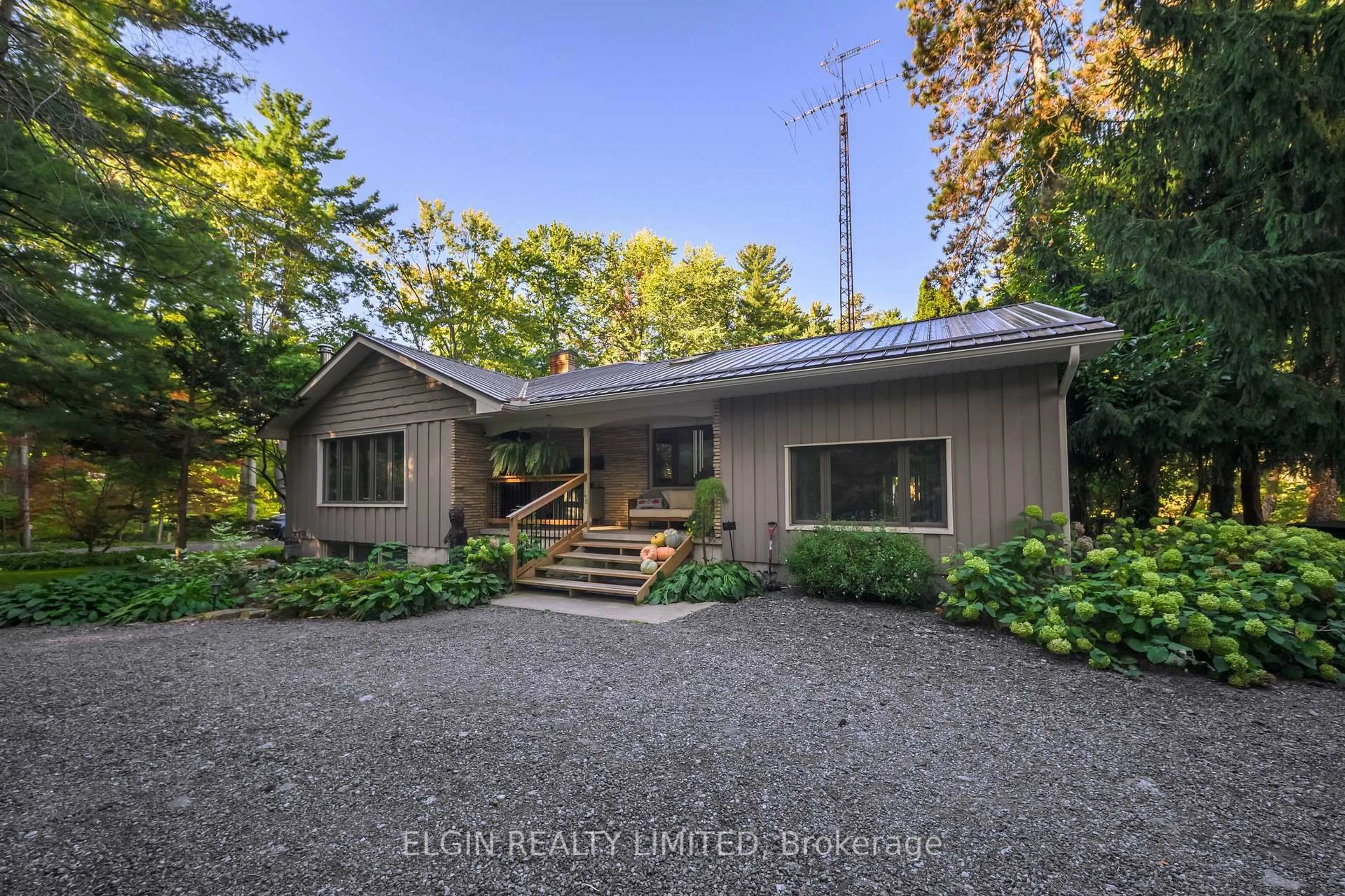 A pic from outside/outdoor area/front of a property/back of a property/a pic from drone, unknown for 8031 ROGERS Rd, Malahide Ontario N5H 2R4