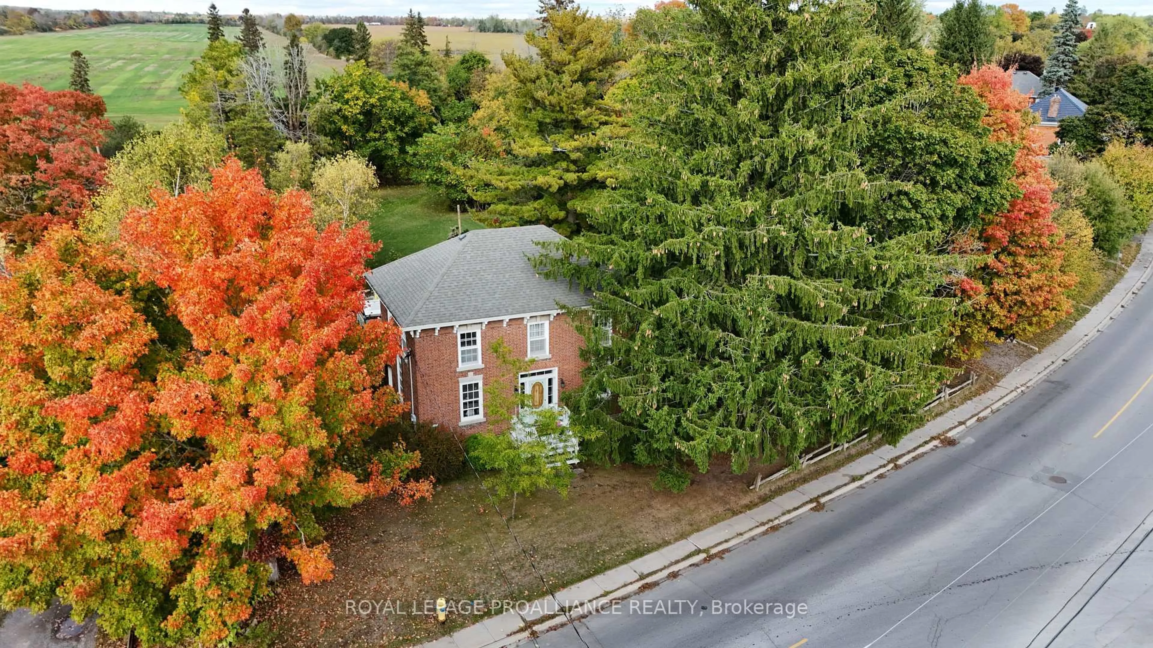 A pic from outside/outdoor area/front of a property/back of a property/a pic from drone, street for 374 Bloomfield Main St, Prince Edward County Ontario K0K 1G0
