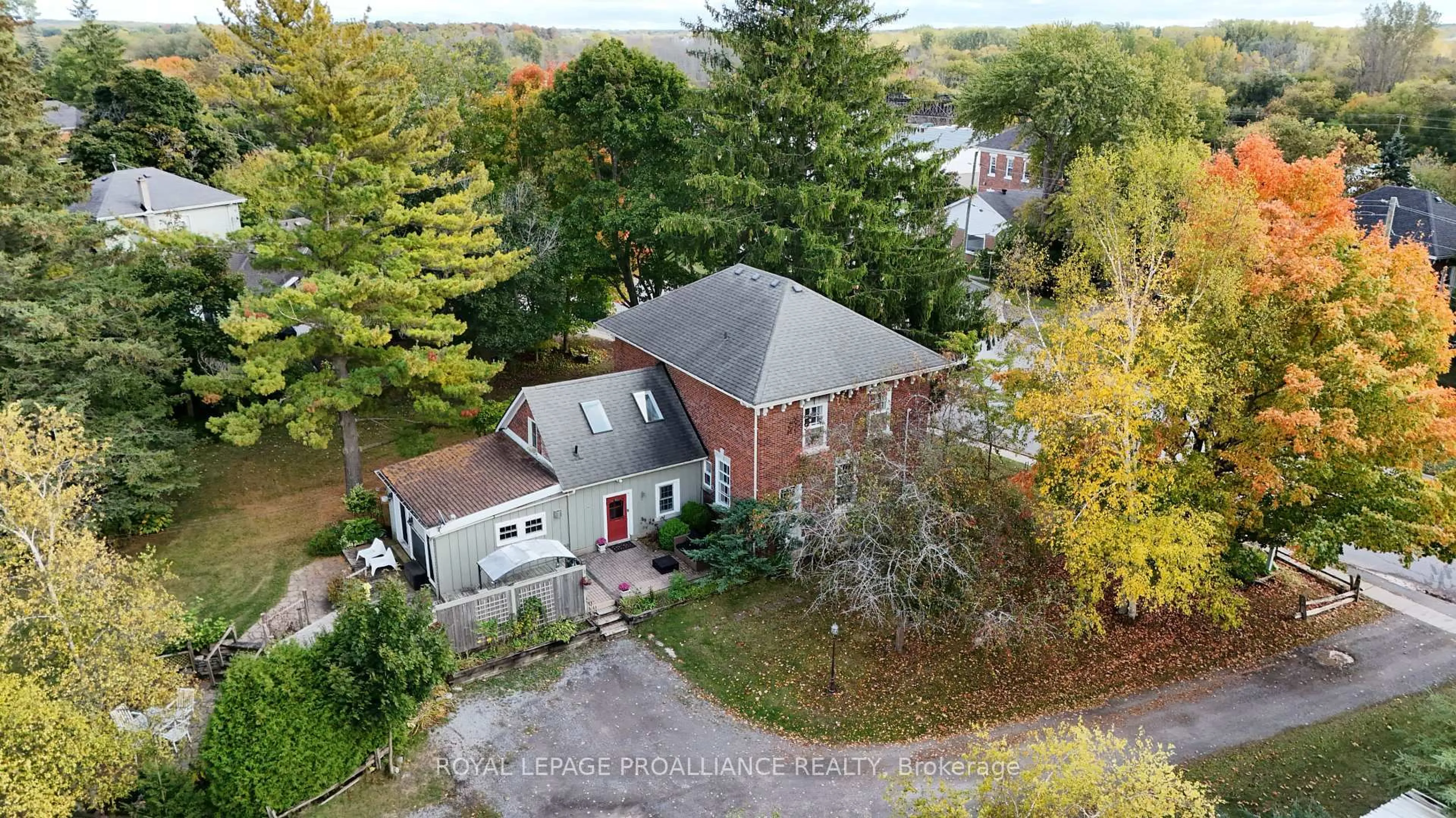 A pic from outside/outdoor area/front of a property/back of a property/a pic from drone, street for 374 Bloomfield Main St, Prince Edward County Ontario K0K 1G0