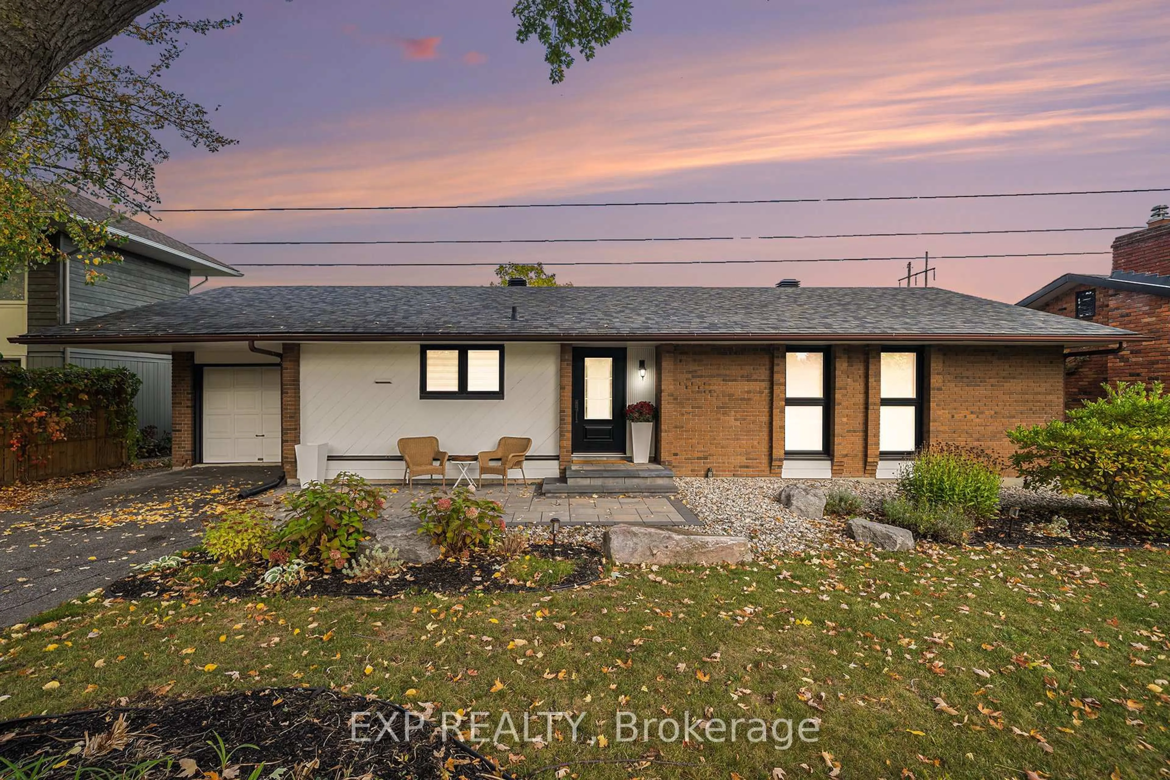 A pic from outside/outdoor area/front of a property/back of a property/a pic from drone, street for 203 Penfield Dr, Ottawa Ontario K2K 1M8