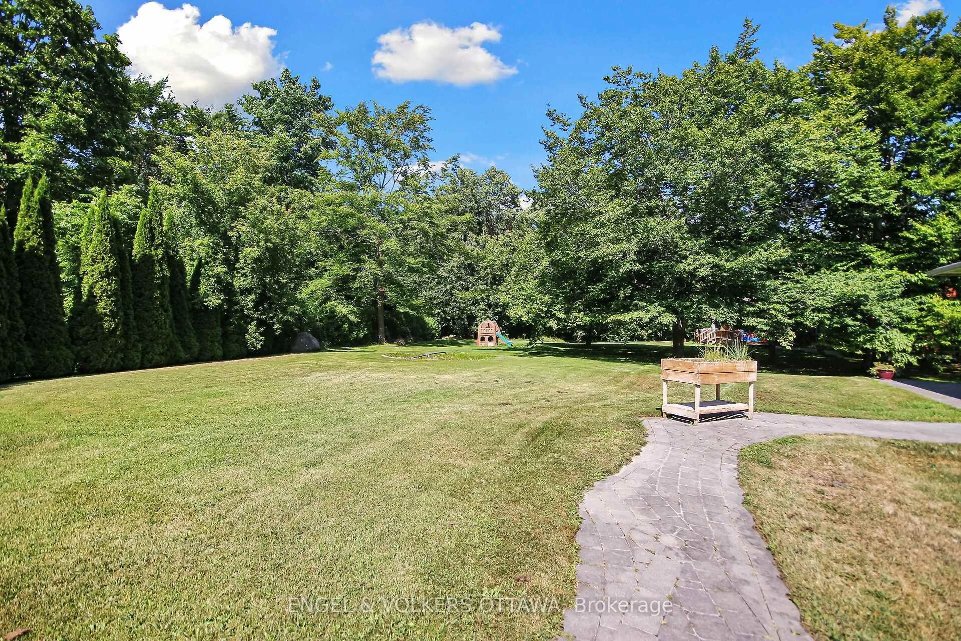 A pic from outside/outdoor area/front of a property/back of a property/a pic from drone, forest/trees view for 5593 Whitewood Ave, Ottawa Ontario K4M 1E1