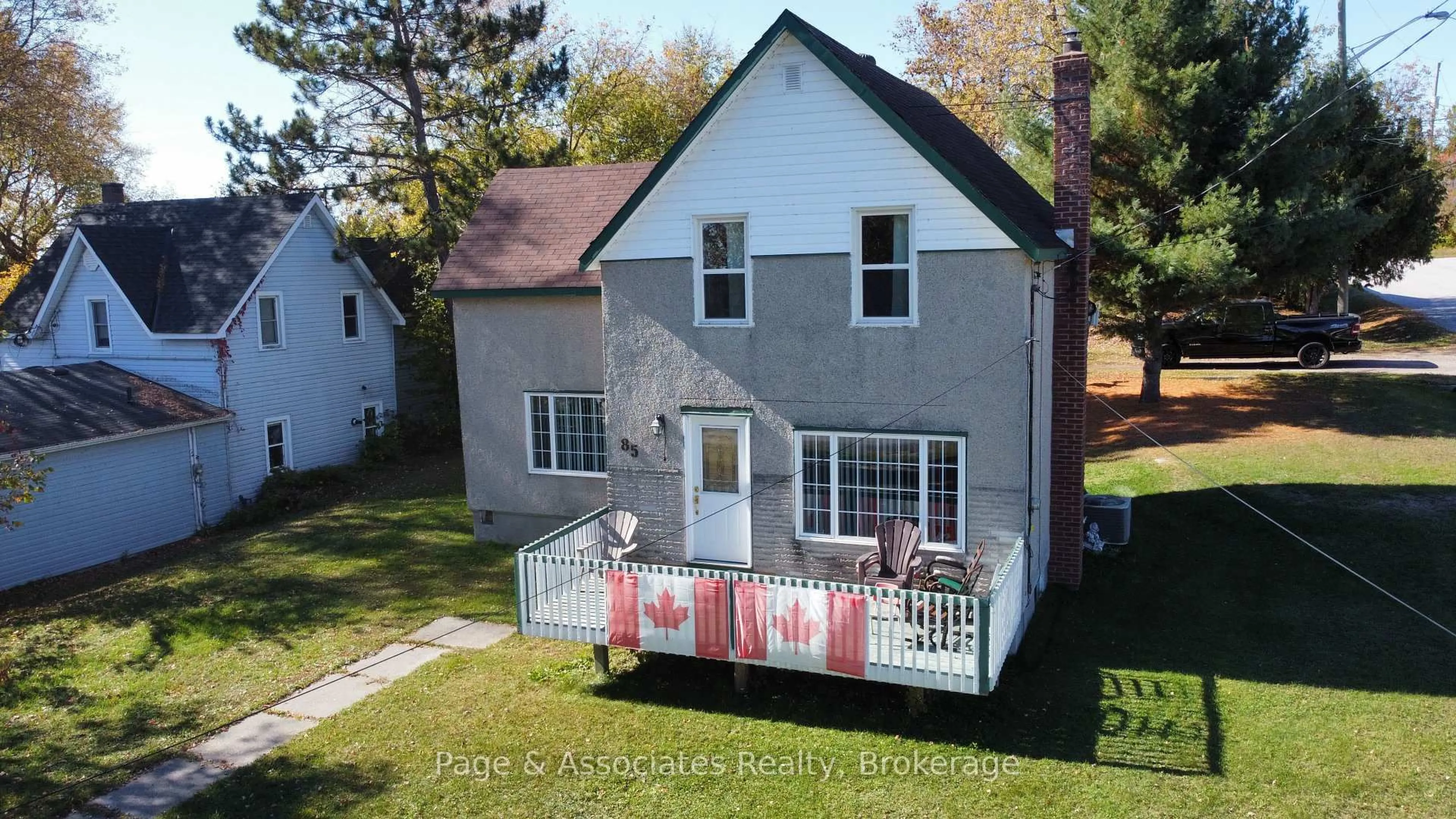 A pic from outside/outdoor area/front of a property/back of a property/a pic from drone, street for 85 Cache St, West Nipissing Ontario P0H 1G0