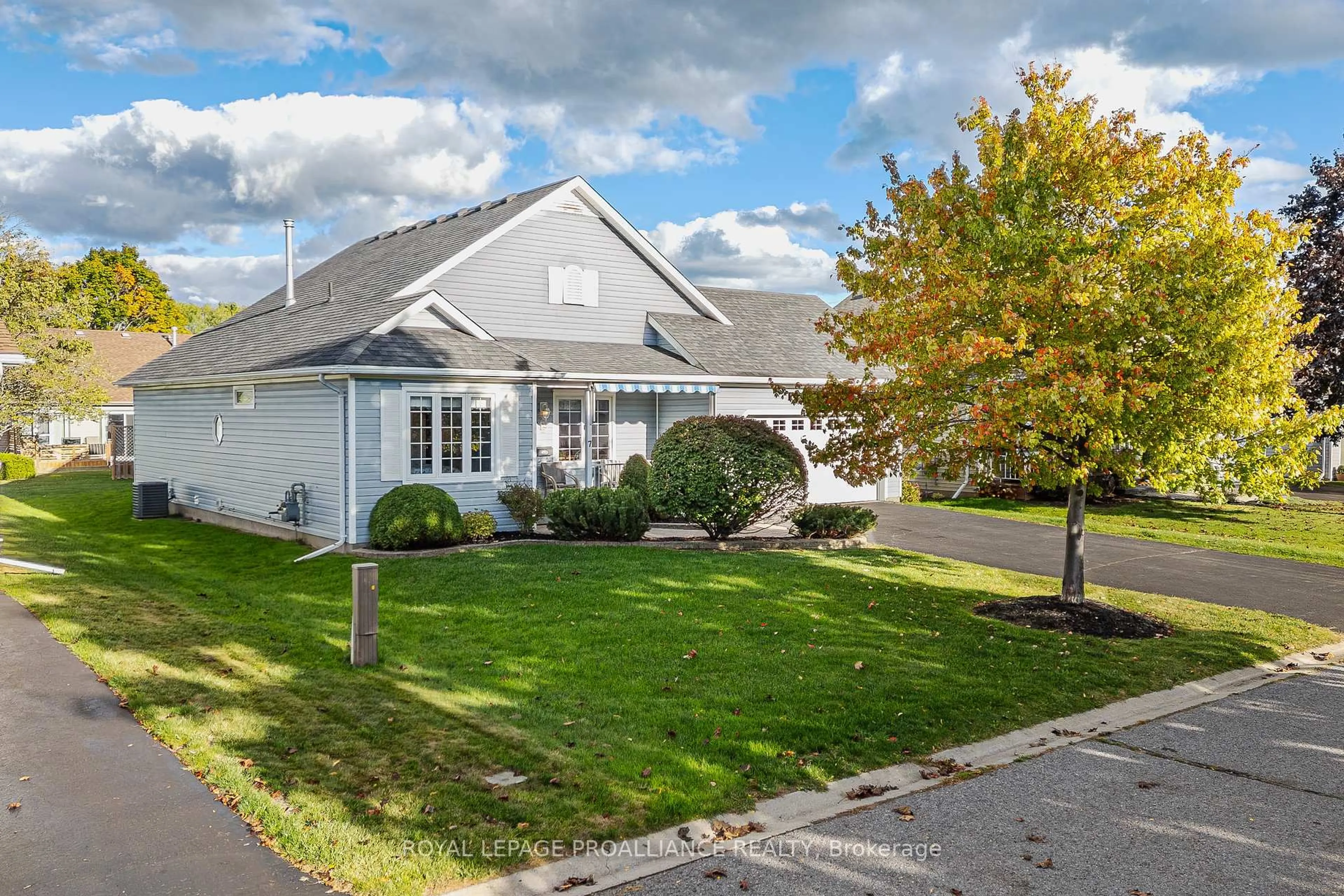 Home with vinyl exterior material, street for 7 Nesbitt Dr, Brighton Ontario K0K 1H0