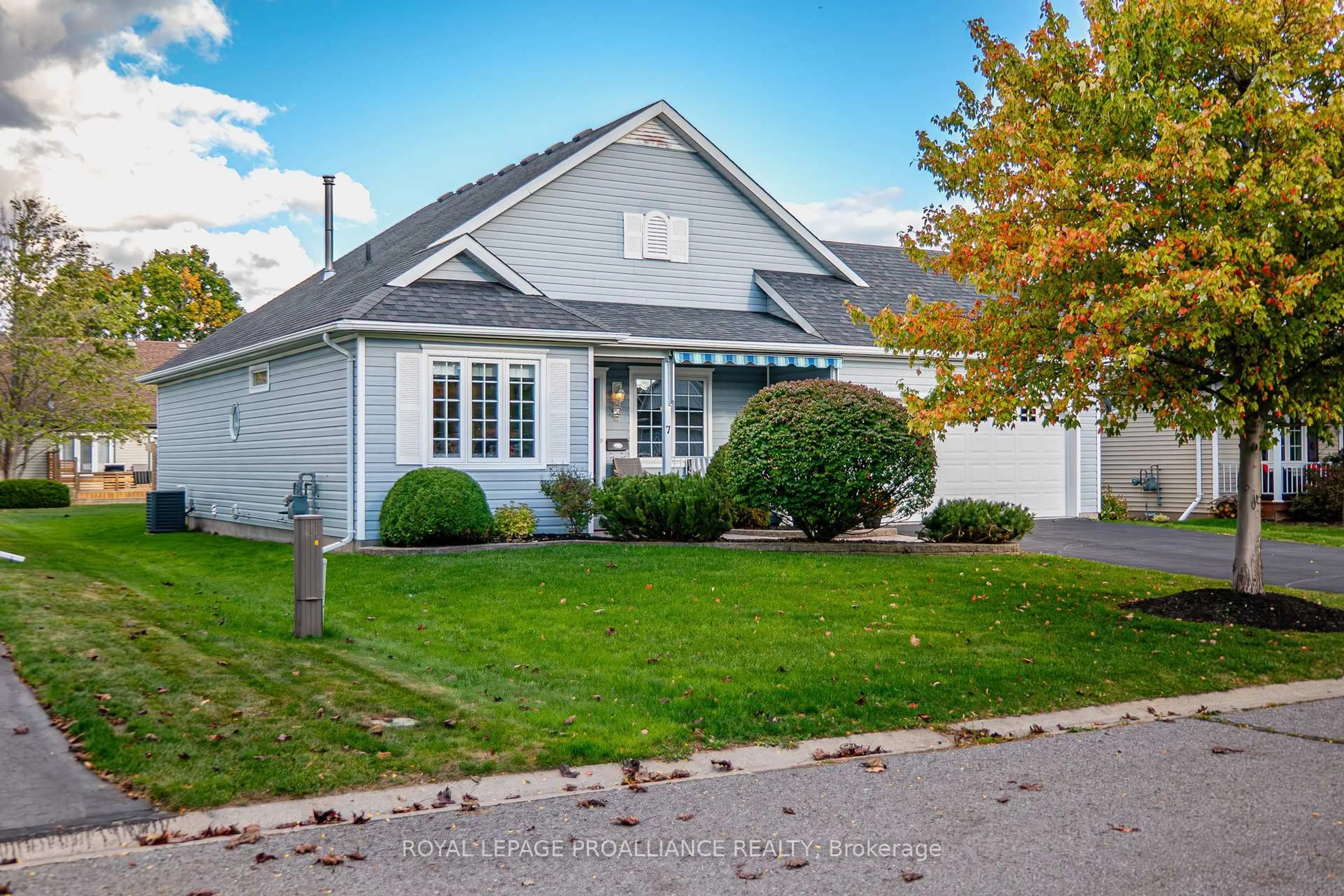 Home with vinyl exterior material, street for 7 Nesbitt Dr, Brighton Ontario K0K 1H0