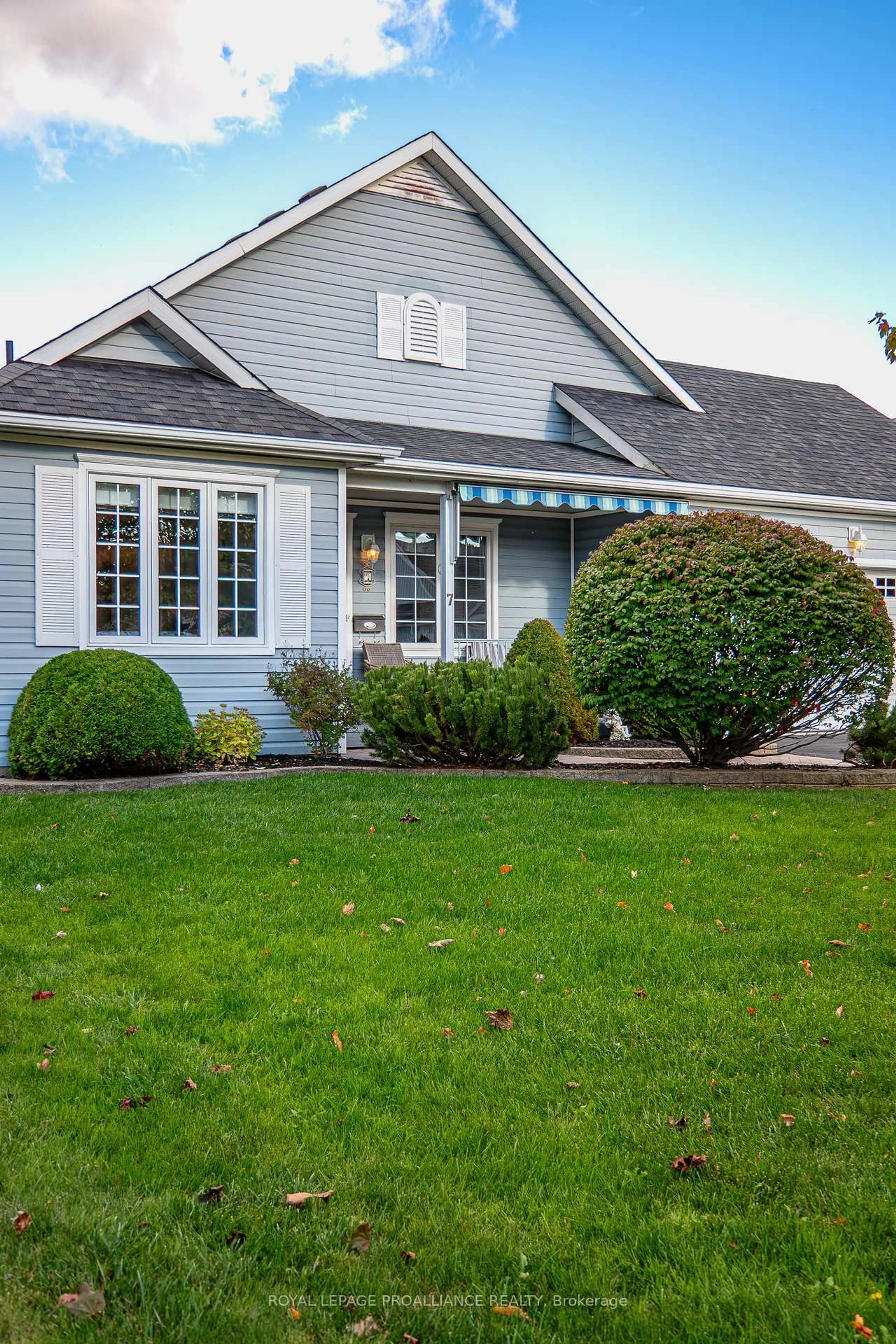 Home with vinyl exterior material, street for 7 Nesbitt Dr, Brighton Ontario K0K 1H0