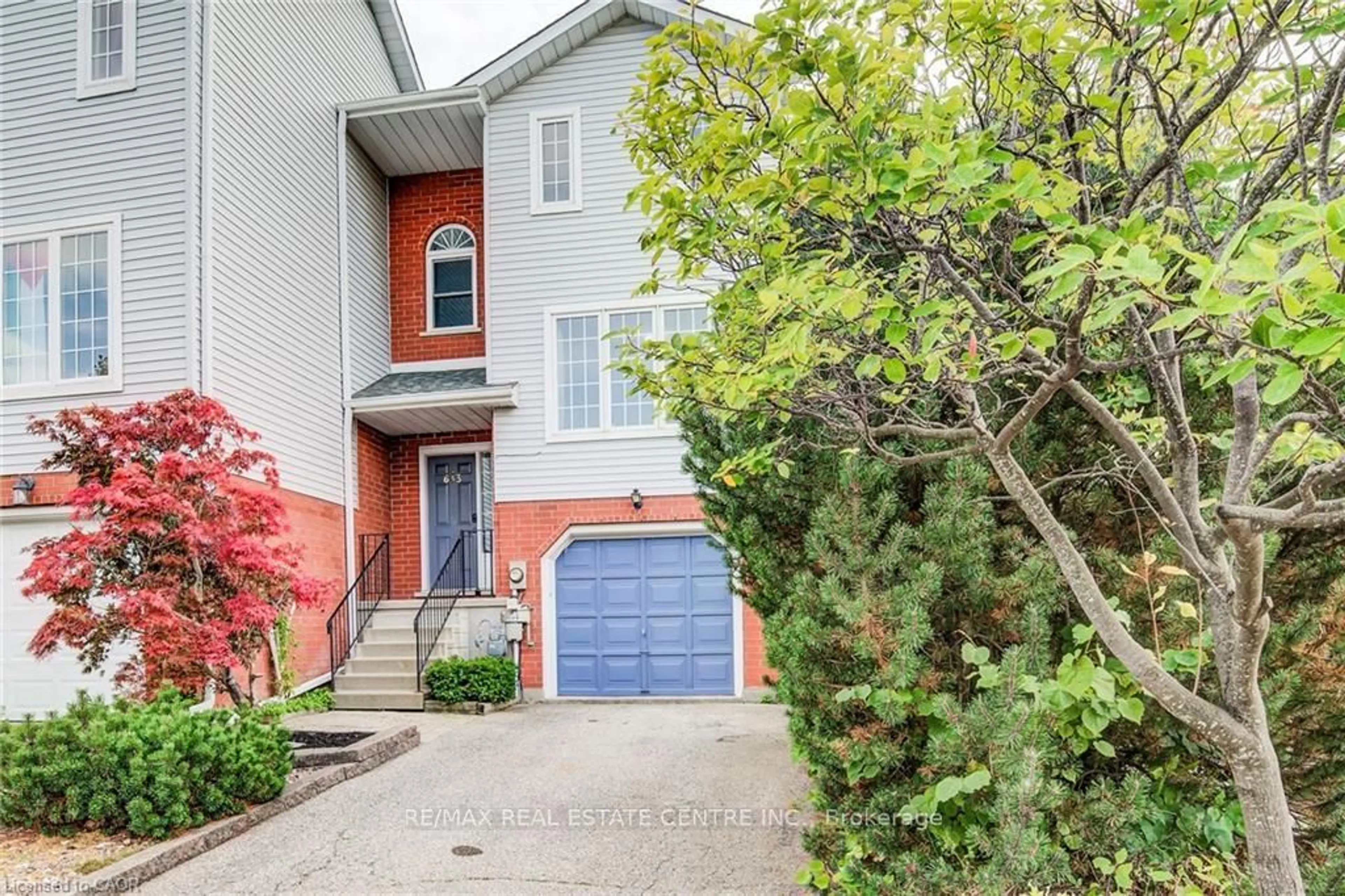 Home with brick exterior material, street for 633 Grange Cres, Waterloo Ontario N2T 2L9