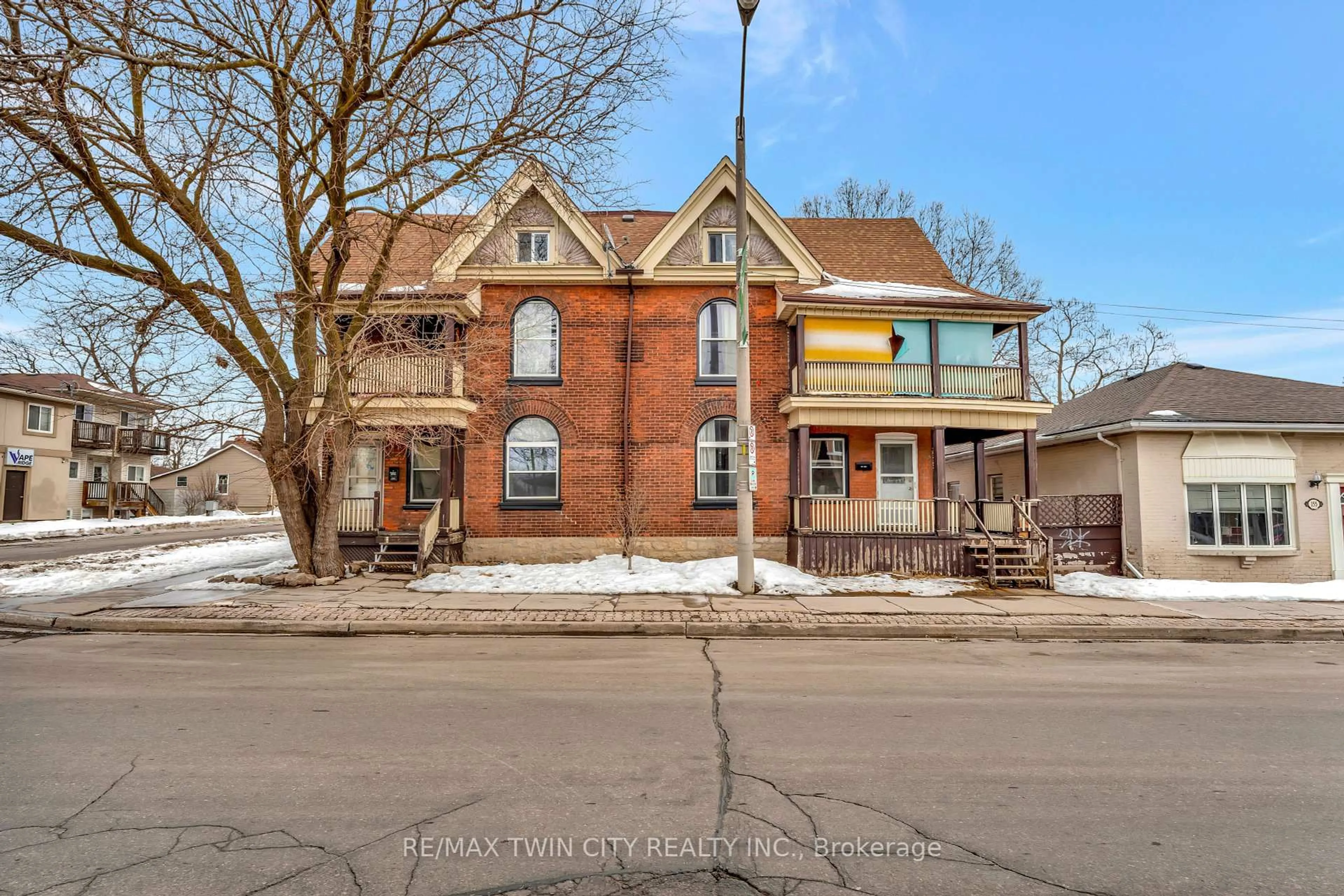Home with brick exterior material, street for 157-159 Market St, Brantford Ontario N3T 3A3