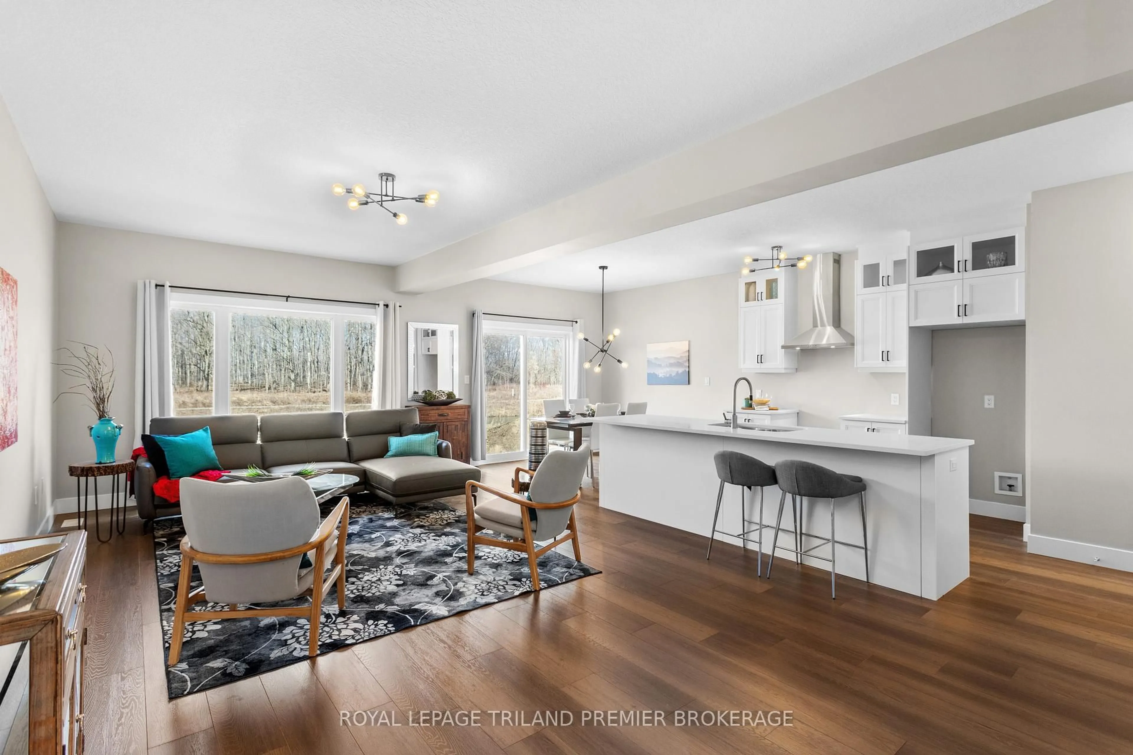 Open concept kitchen, wood/laminate floor for 1597 CHICKADEE Tr, London South Ontario N6M 1G4