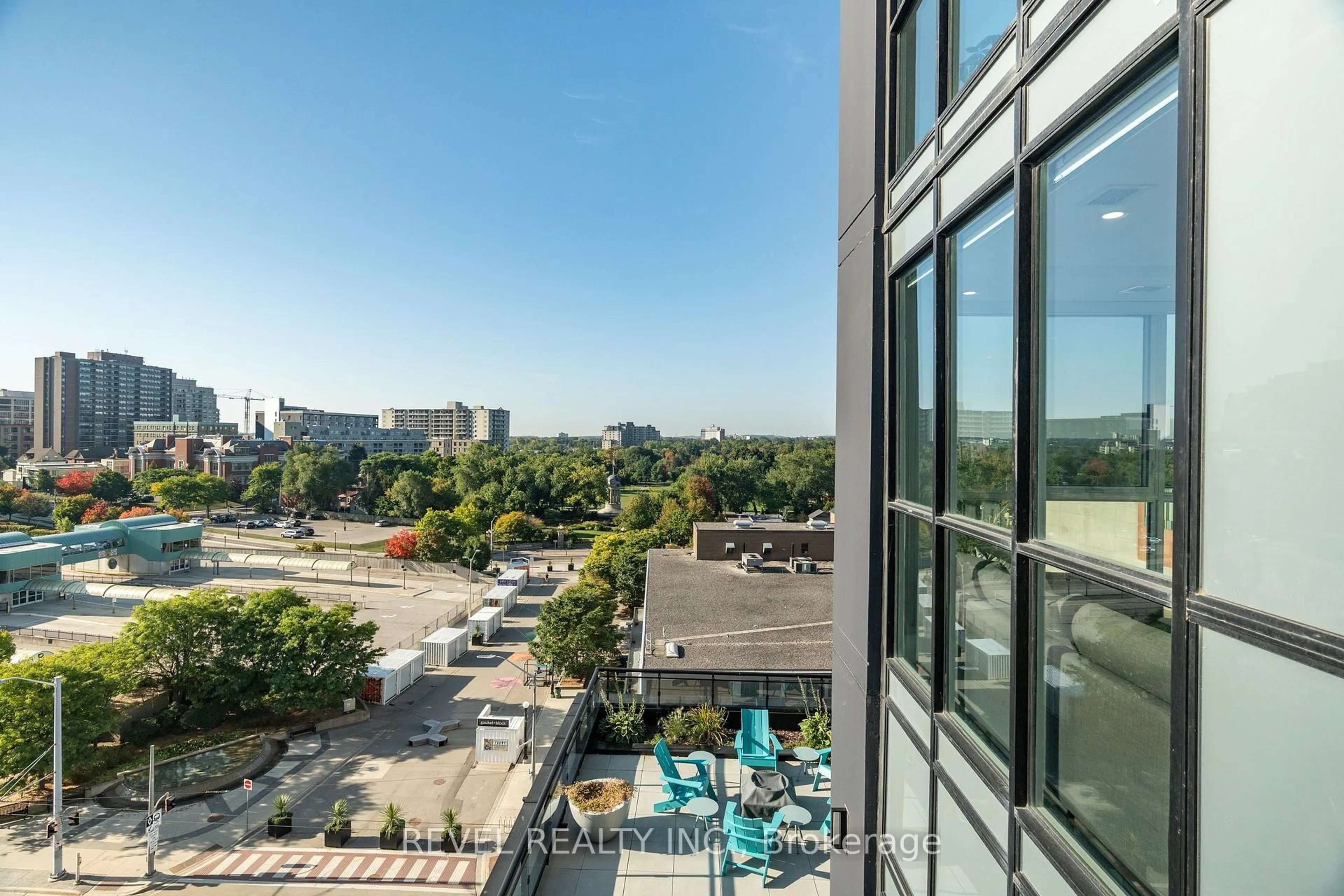 Patio, city buildings view from balcony for 60 Charles St #5, Kitchener Ontario N2G 0C9
