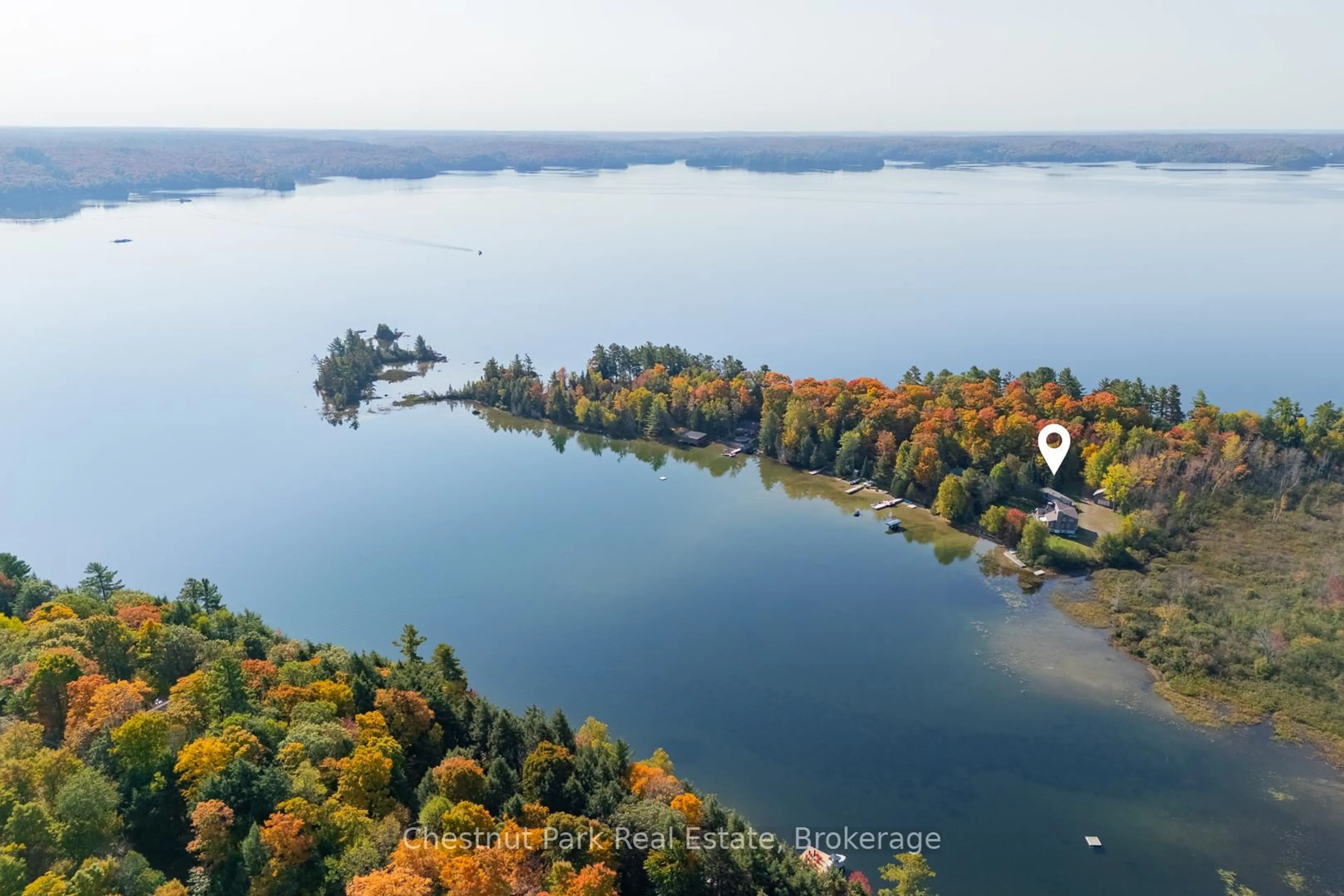 A pic from outside/outdoor area/front of a property/back of a property/a pic from drone, water/lake/river/ocean view for 170 Long Point Rd, Huntsville Ontario P0B 1M0