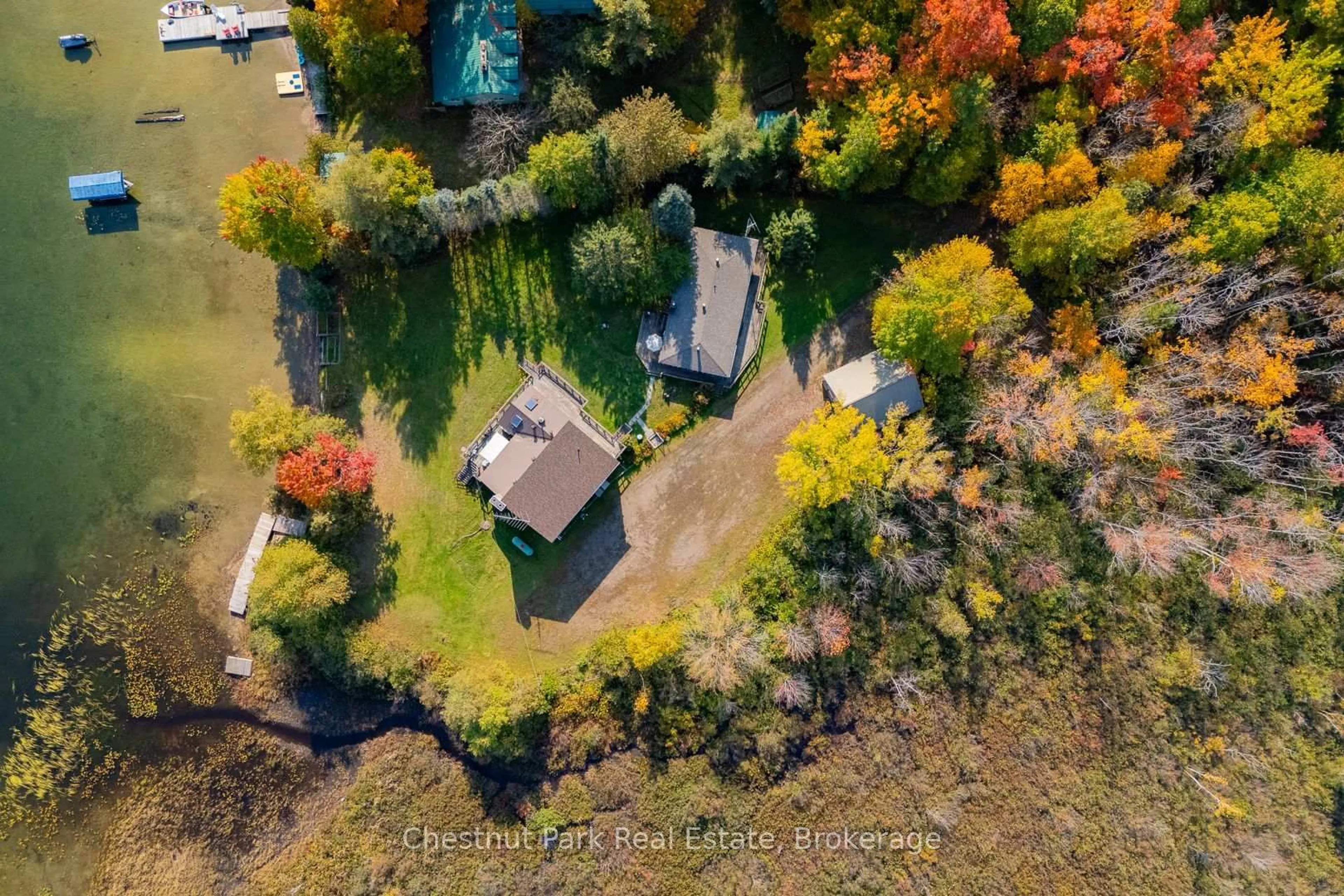 A pic from outside/outdoor area/front of a property/back of a property/a pic from drone, forest/trees view for 170 Long Point Rd, Huntsville Ontario P0B 1M0