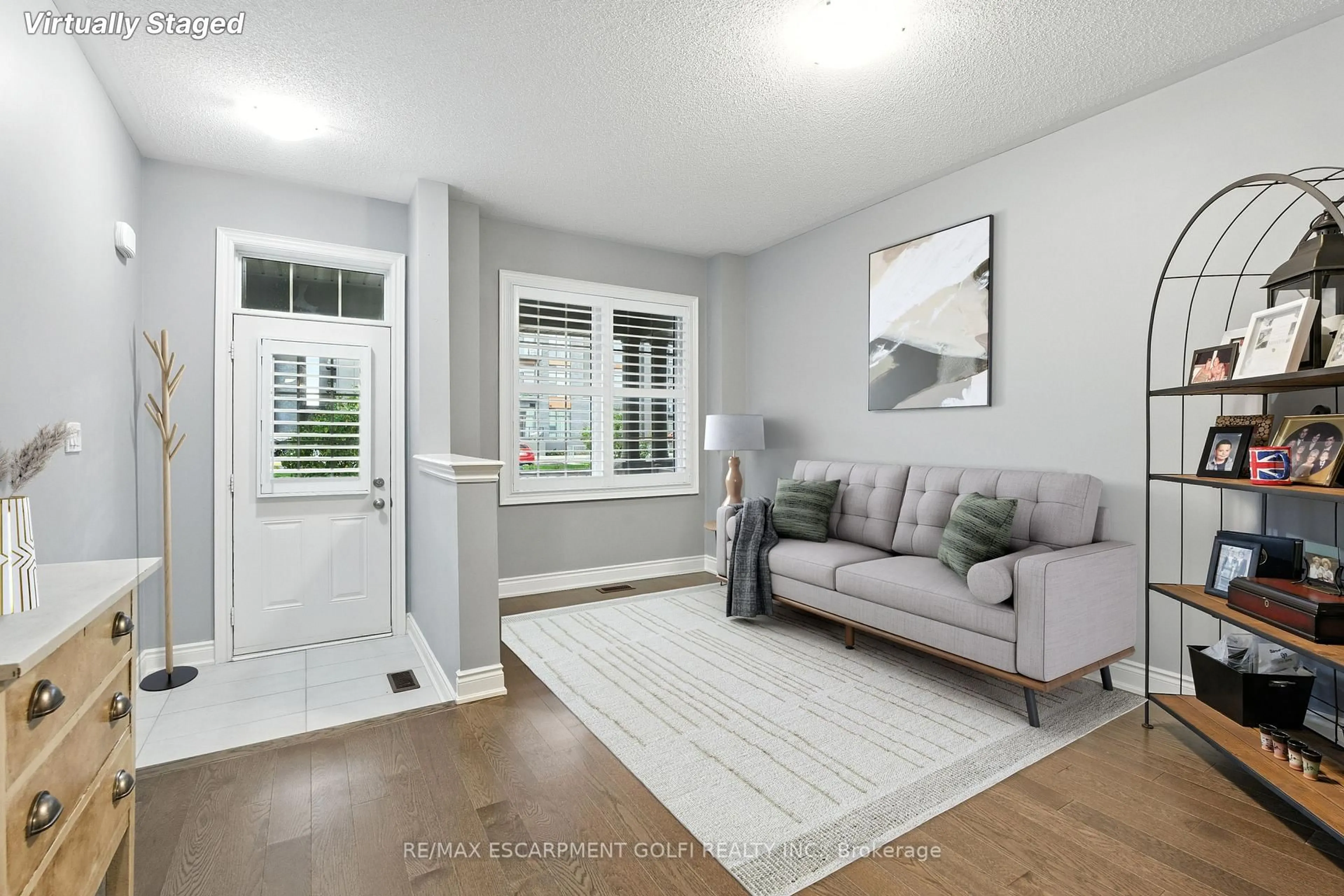 Living room with furniture, unknown for 29 Riverwalk Dr, Hamilton Ontario L8B 1X3